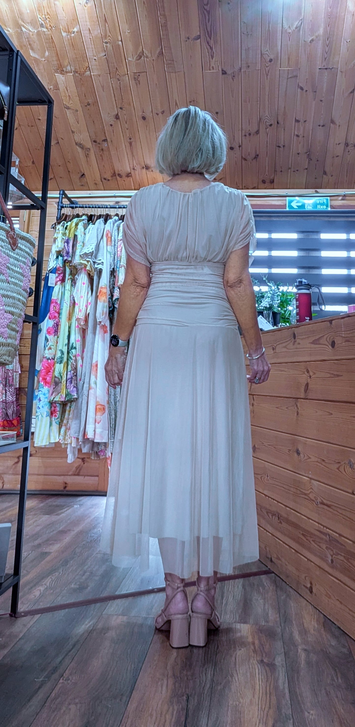 Rear view Elegant summer occasion dress with soft sleeves