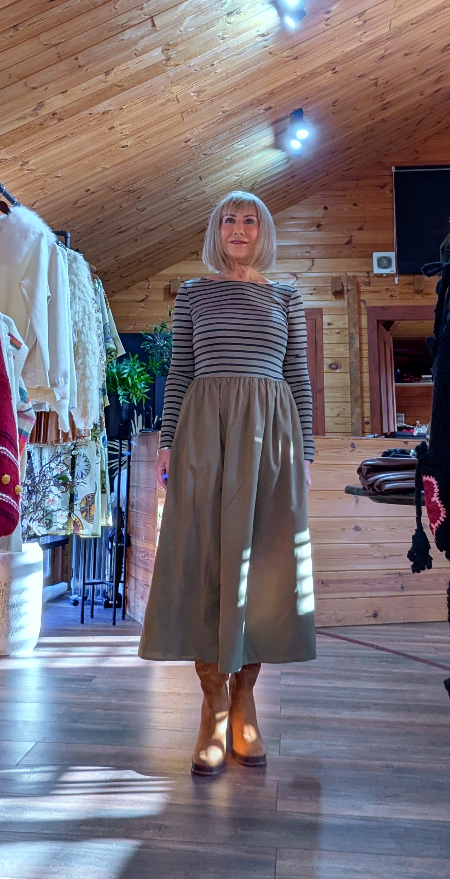 Olive green midi dress with striped top and flared skirt