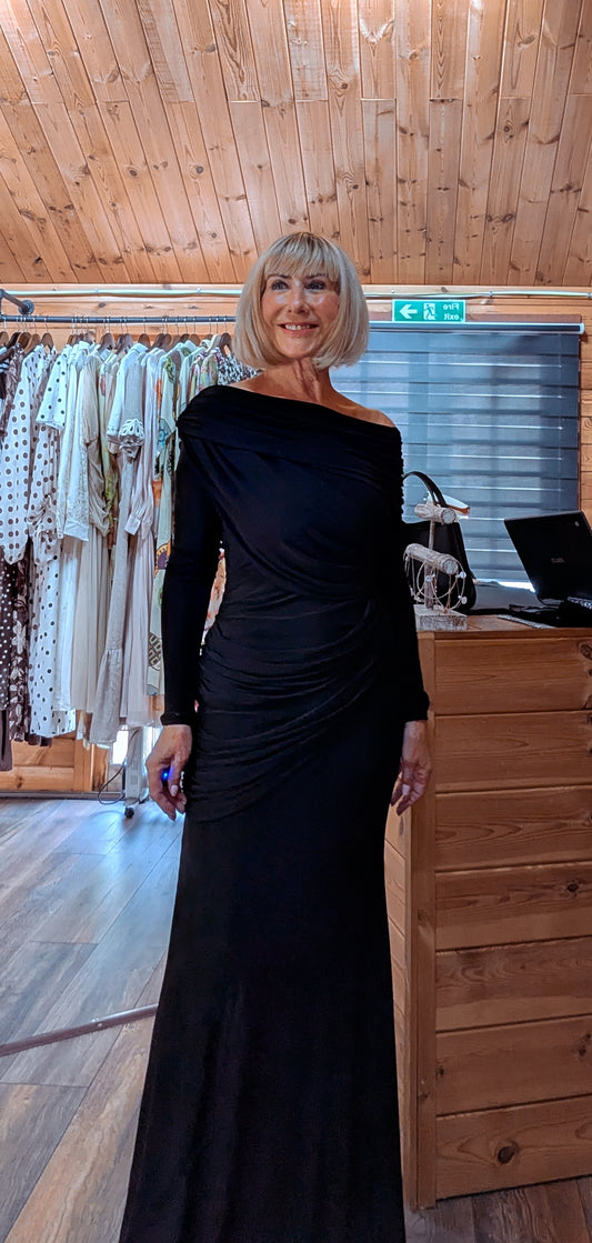 Front view of the Tilda black occasion dress with an elegant draped neckline.