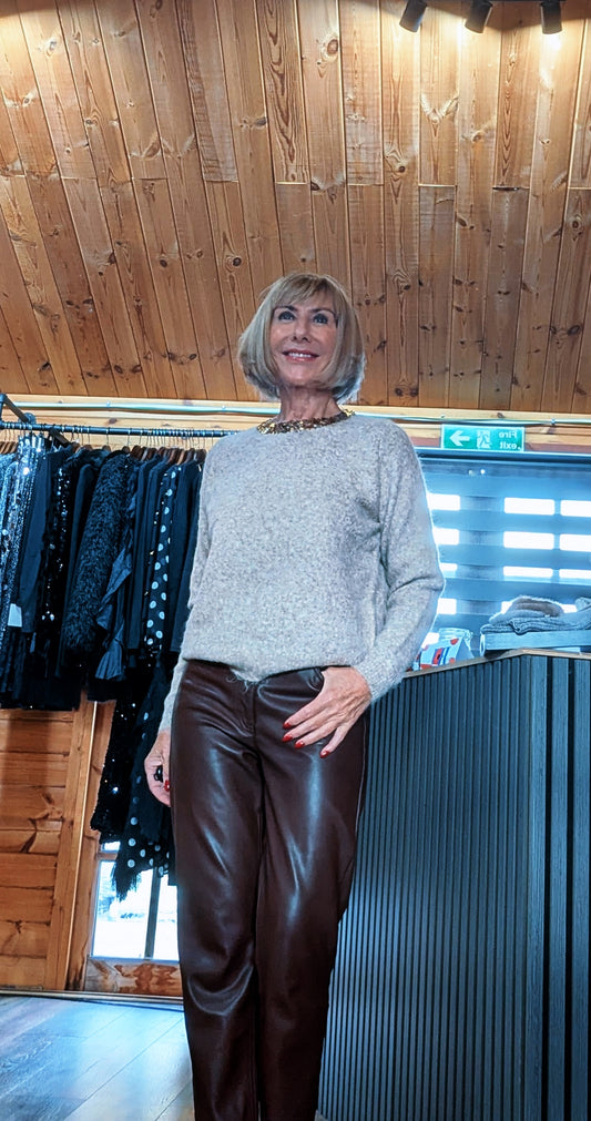 Di wearing the Pixie taupe jumper with an embellished gold neckline and chocolate trousers