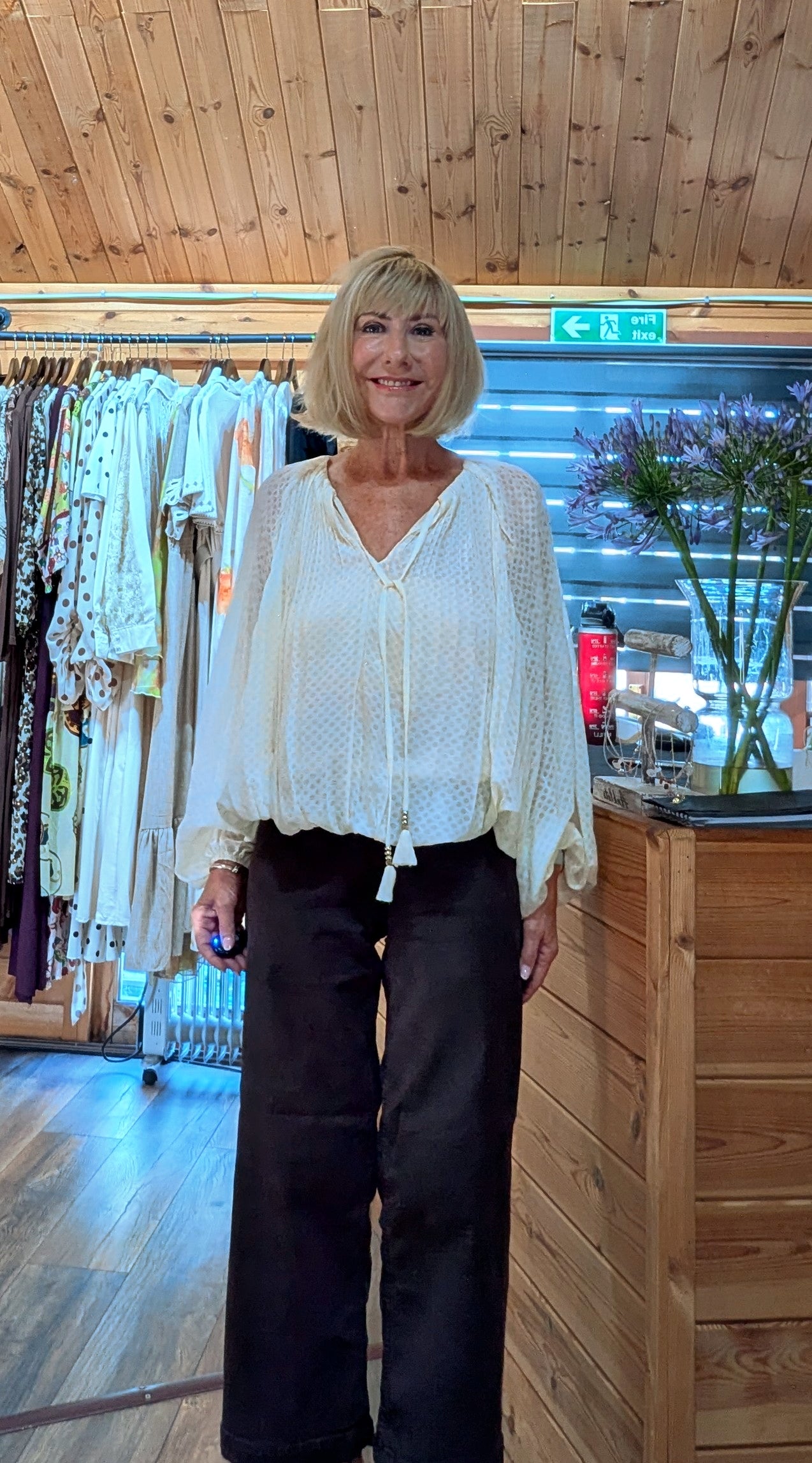 Front view of the Jasmine blouse with a flattering bubble hem.