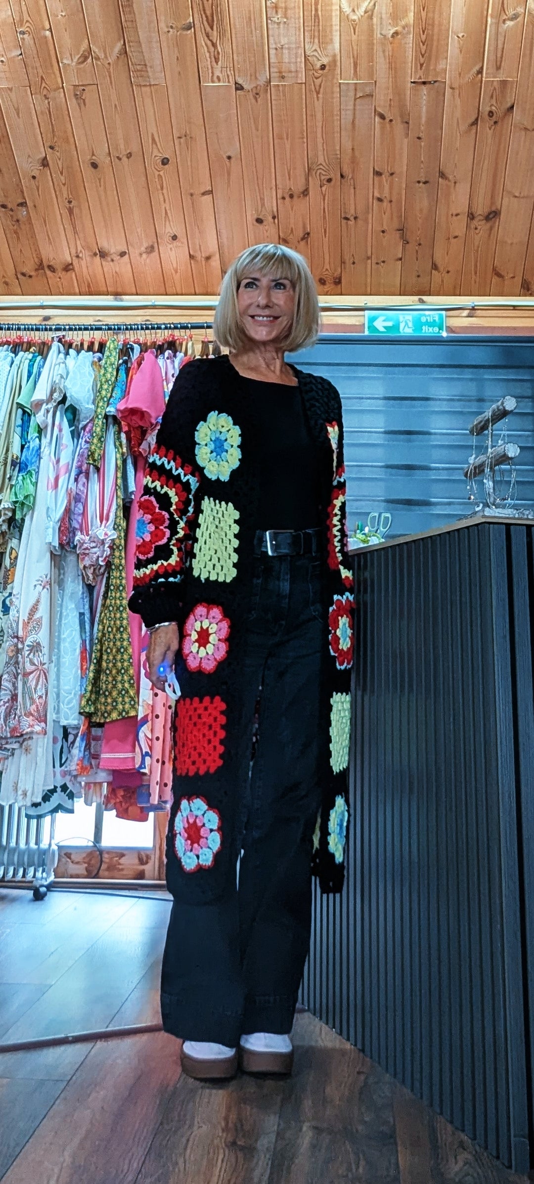 Fia black longline cardigan with colourful crochet-style flower squares, one size UK 8–14 styled by ditsydi 
