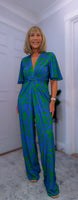 Justina Tropical Green - Fuchsia -Angel Sleeve Maxi Jumpsuit with Twist Detail