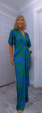 Justina Tropical Green - Fuchsia -Angel Sleeve Maxi Jumpsuit with Twist Detail