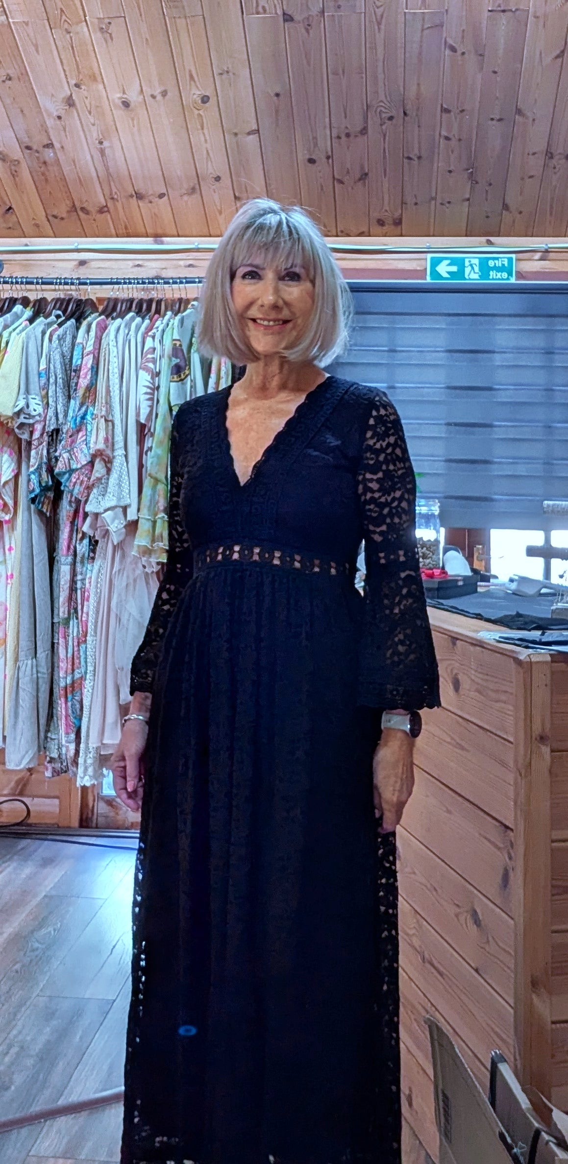 Black lacy pagoda sleeved boho dress close up
