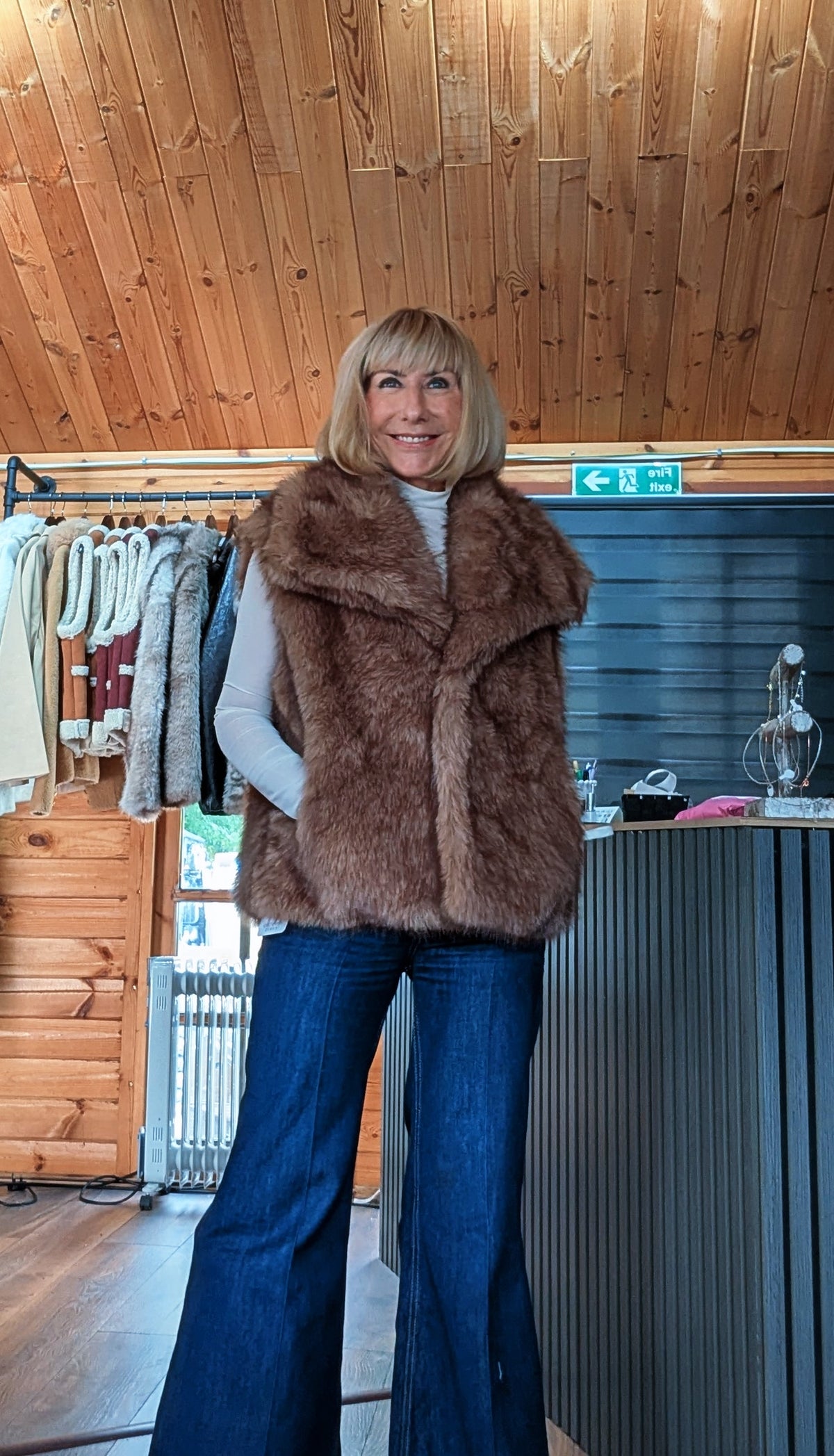 Women’s Coco faux fur gilet in a rich chocolate-brown shade
