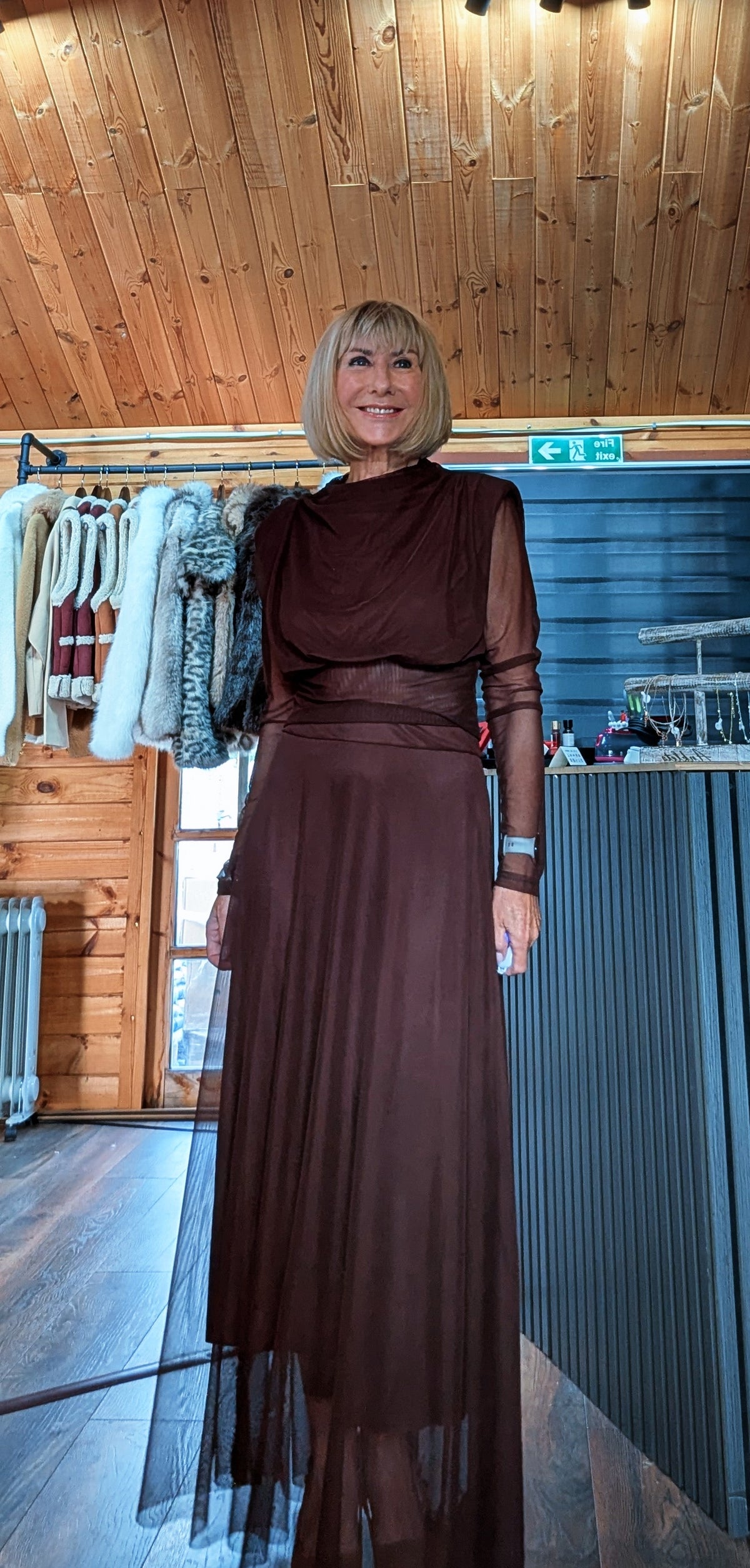 Harlow chocolate two-piece set showing the sheer outer skirt extending below the lining