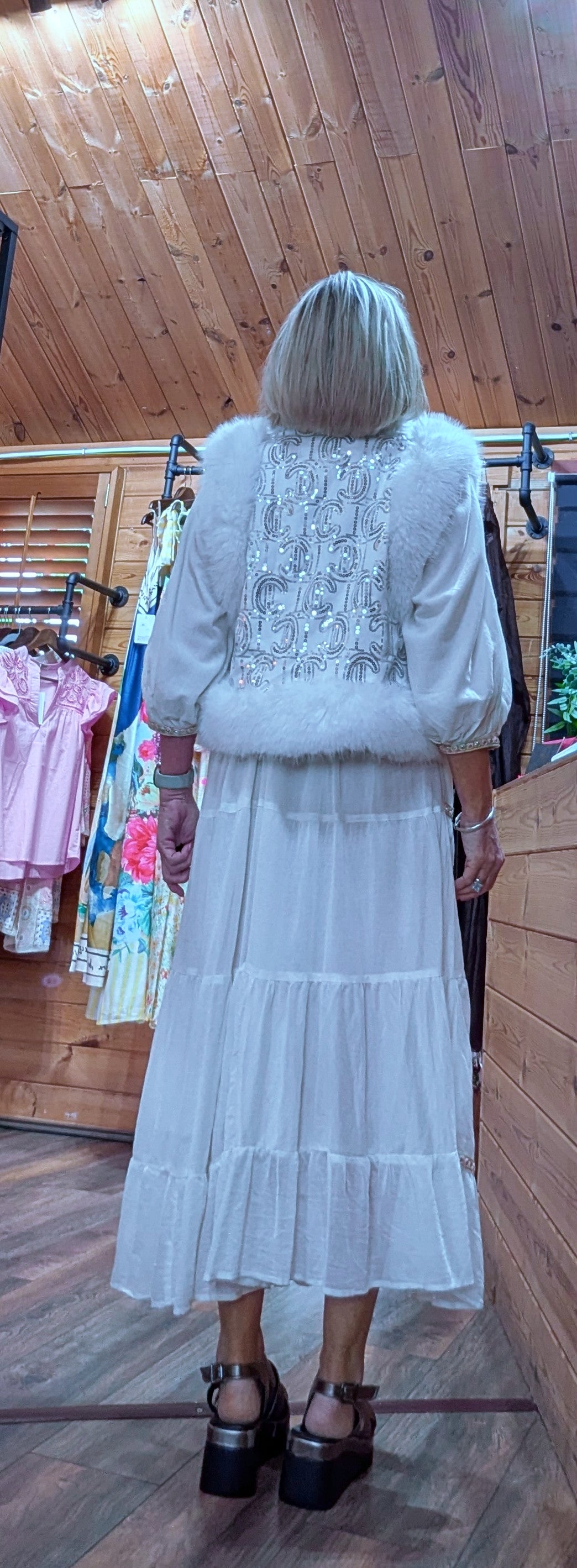 Goldie White Sequin Faux Fur Gilet –  form the back with a tiered white cotton summer dress