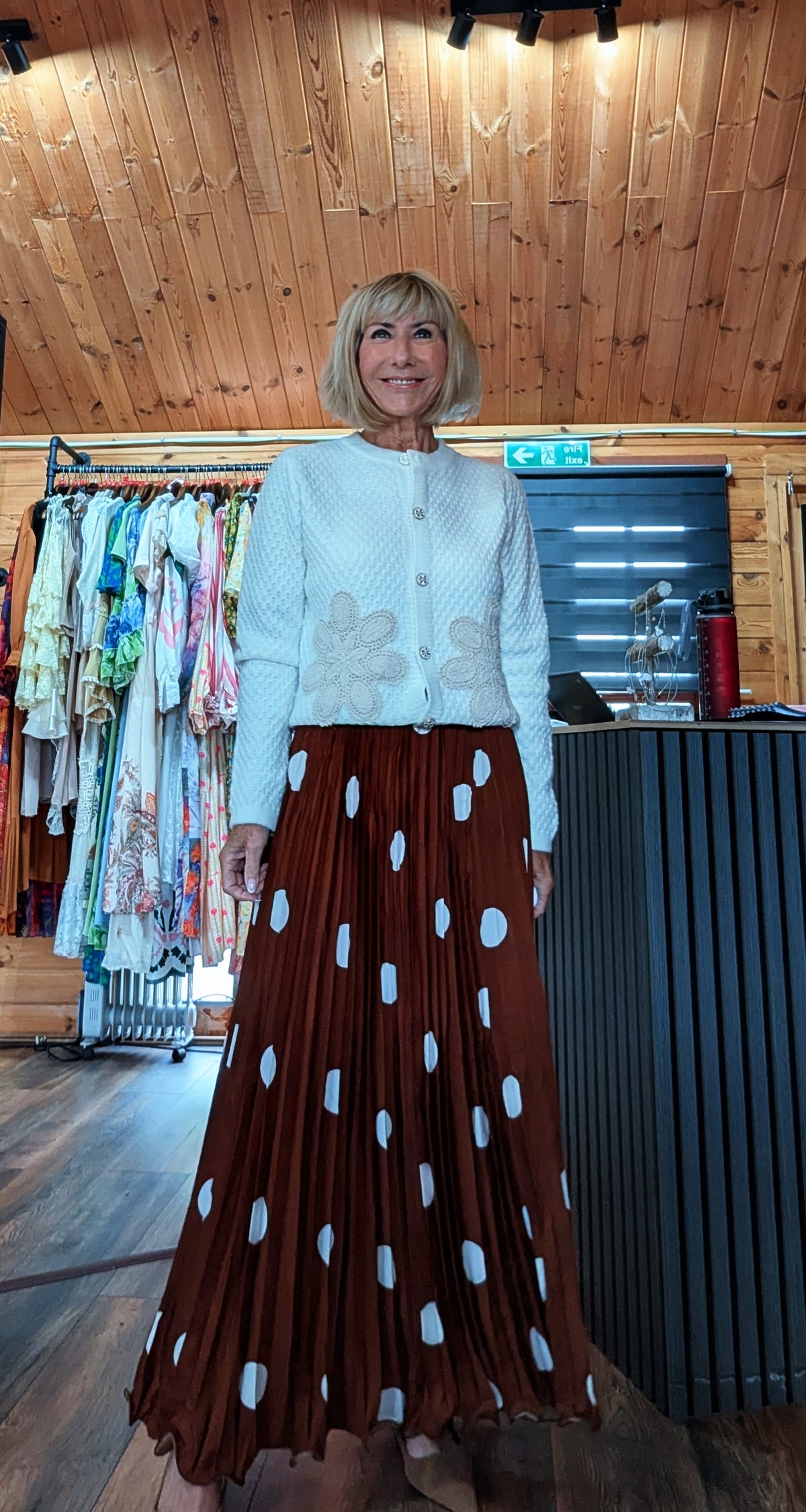 Trinny pleated maxi skirt in rust styled with Aviary ivory embroidered cardigan