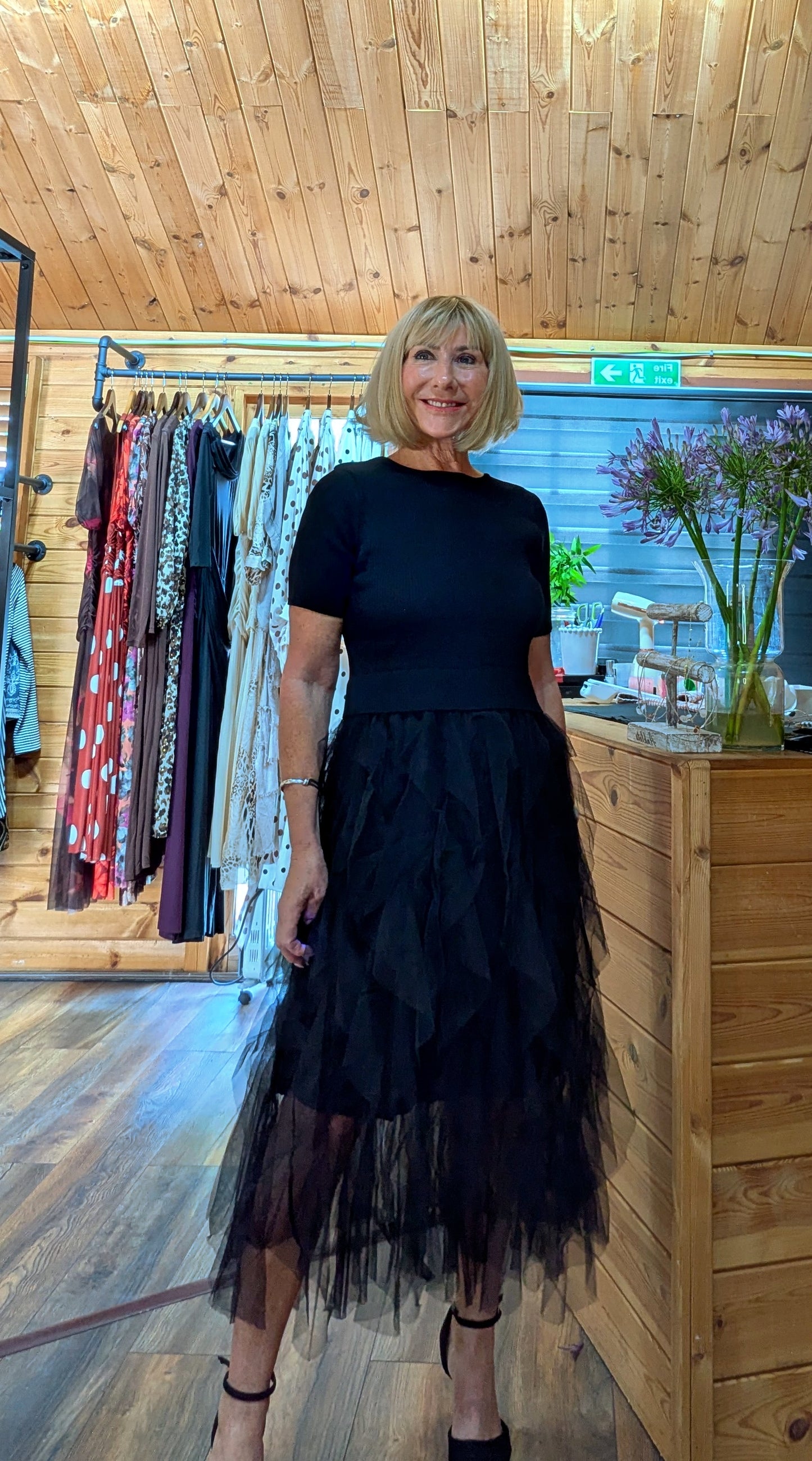 Side view of Storm tulle dress with short sleeves and full tulle skirt