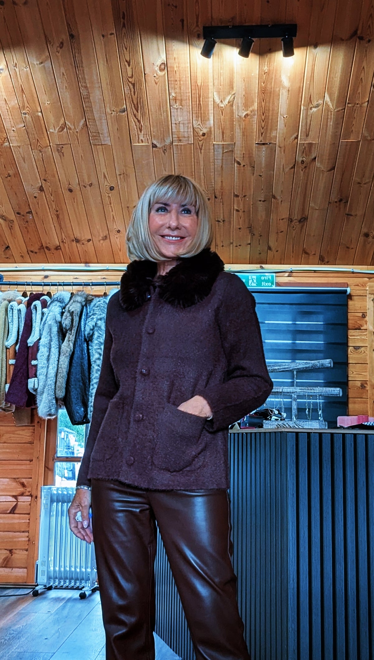 Soft button-front cardigan with long sleeves and faux-fur collar, fitting UK sizes 8–12