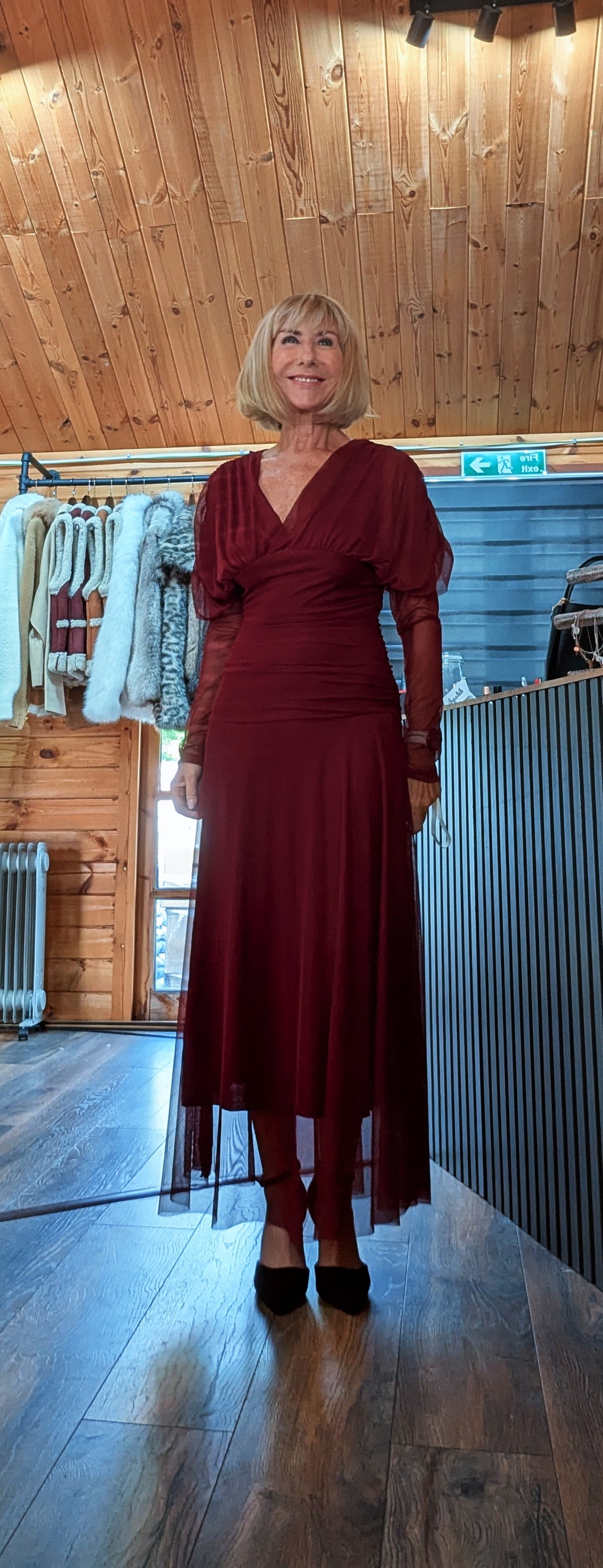Front view of Luna burgundy long-sleeved dress with a flowing tulle skirt
