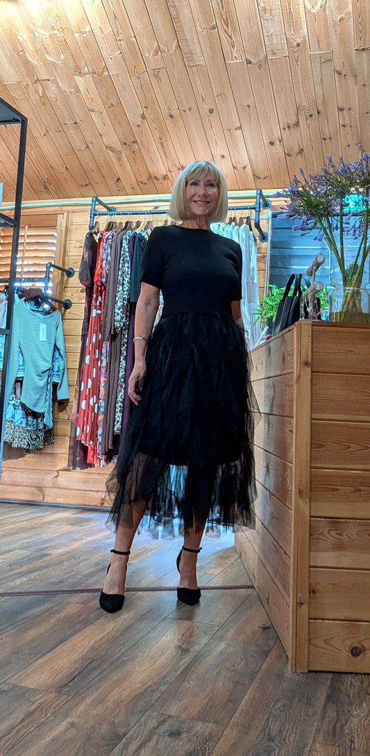 Floaty black tulle dress with short sleeved knit top