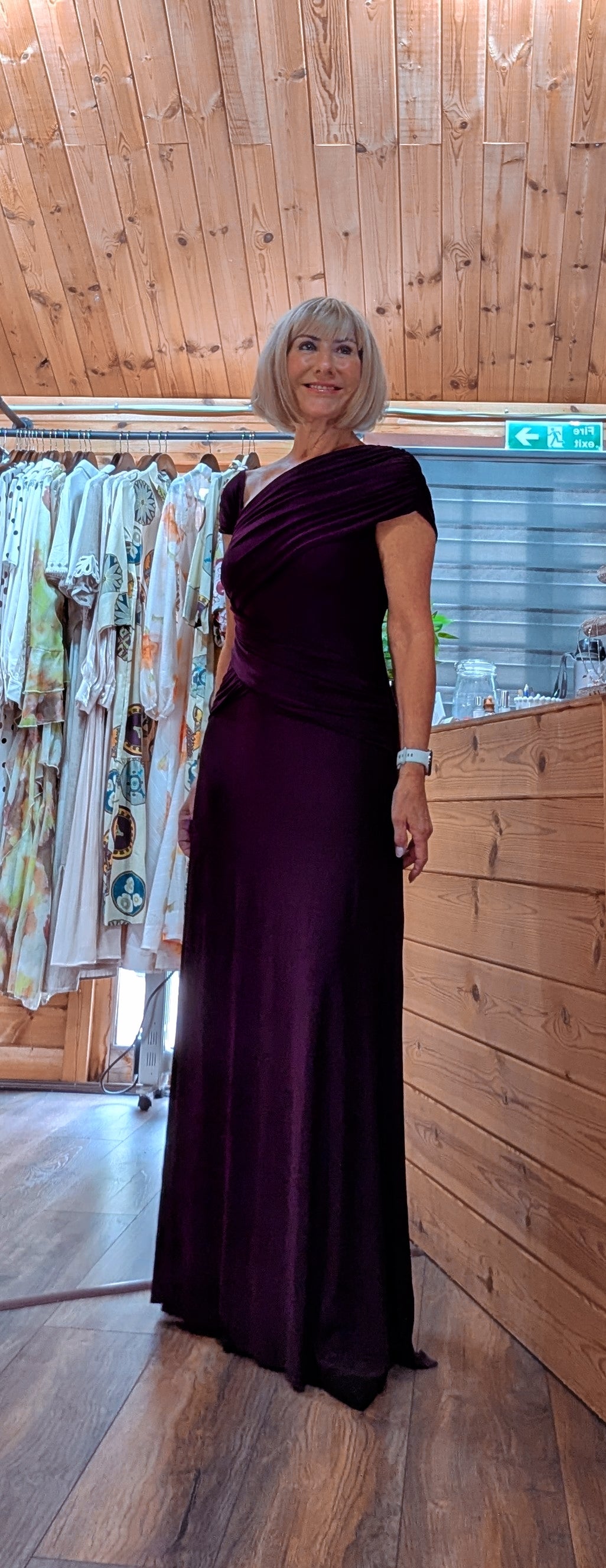 Imogen burgundy occasion dress with side gathering and capped sleeves 