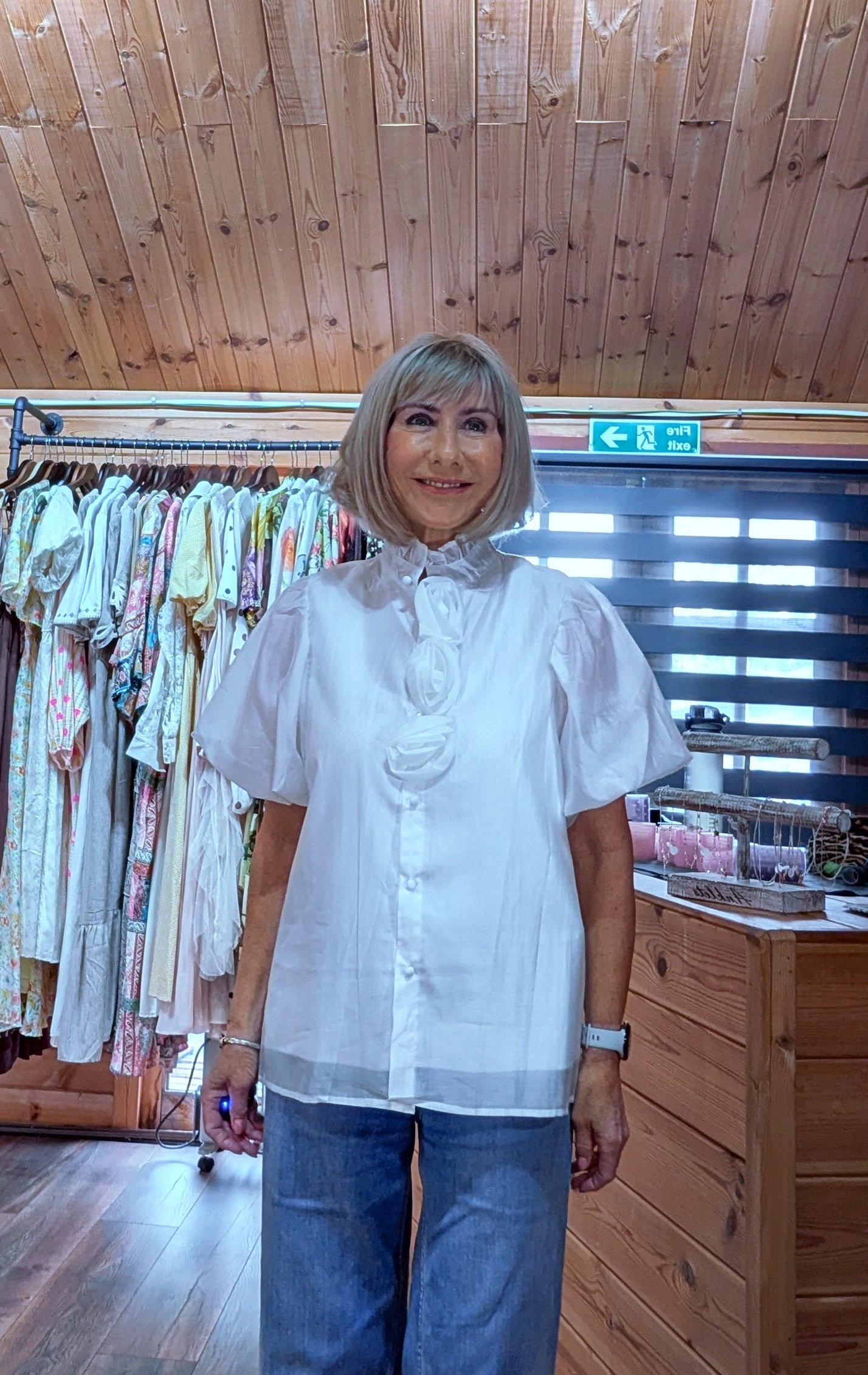 Estelle cream blouse with oversized floral detailing and elegant puff sleeves