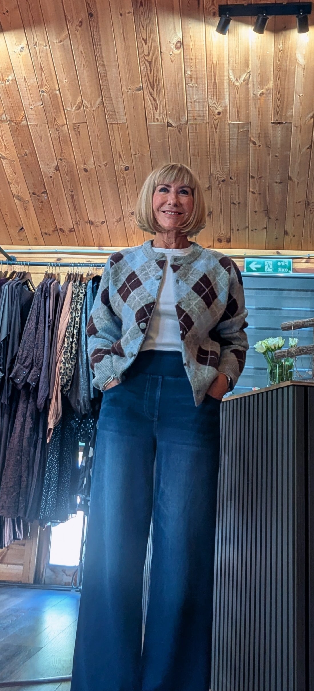Close up Magna knitted cardigan styled with wide jeans