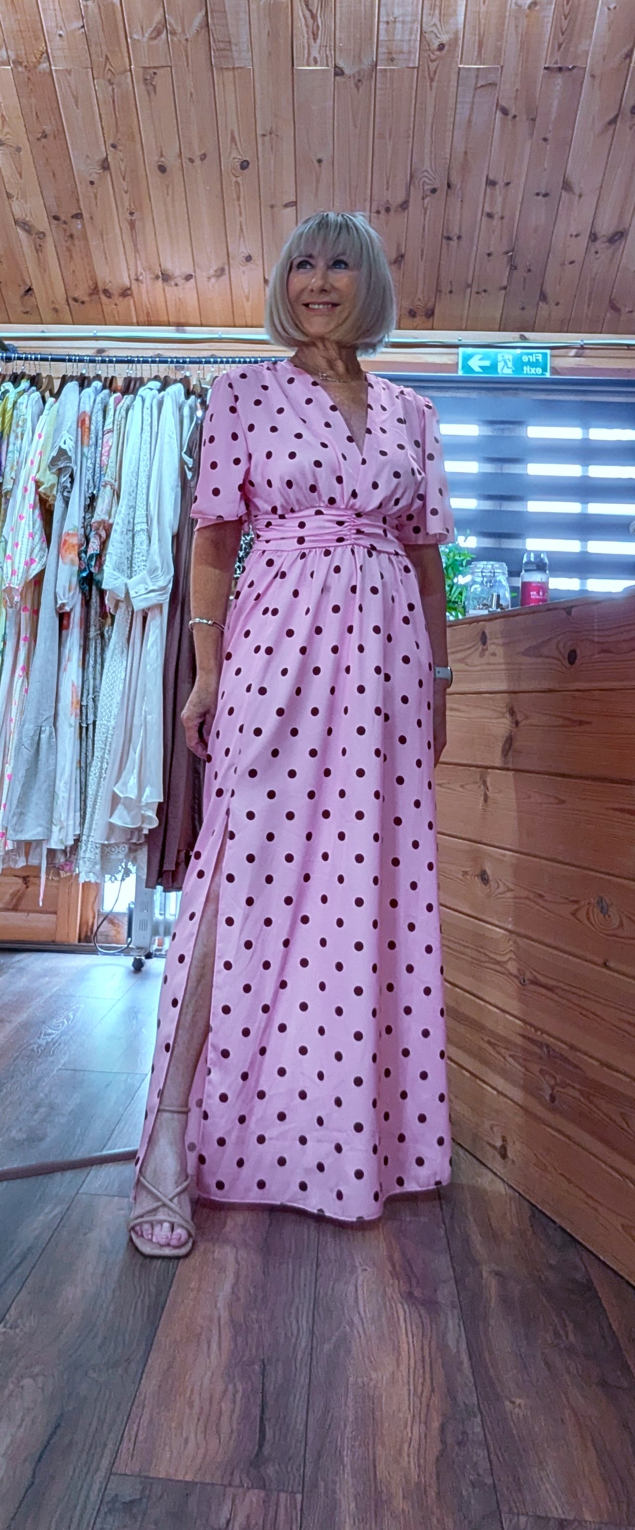 Floaty polka dot occasion dress with elasticated back