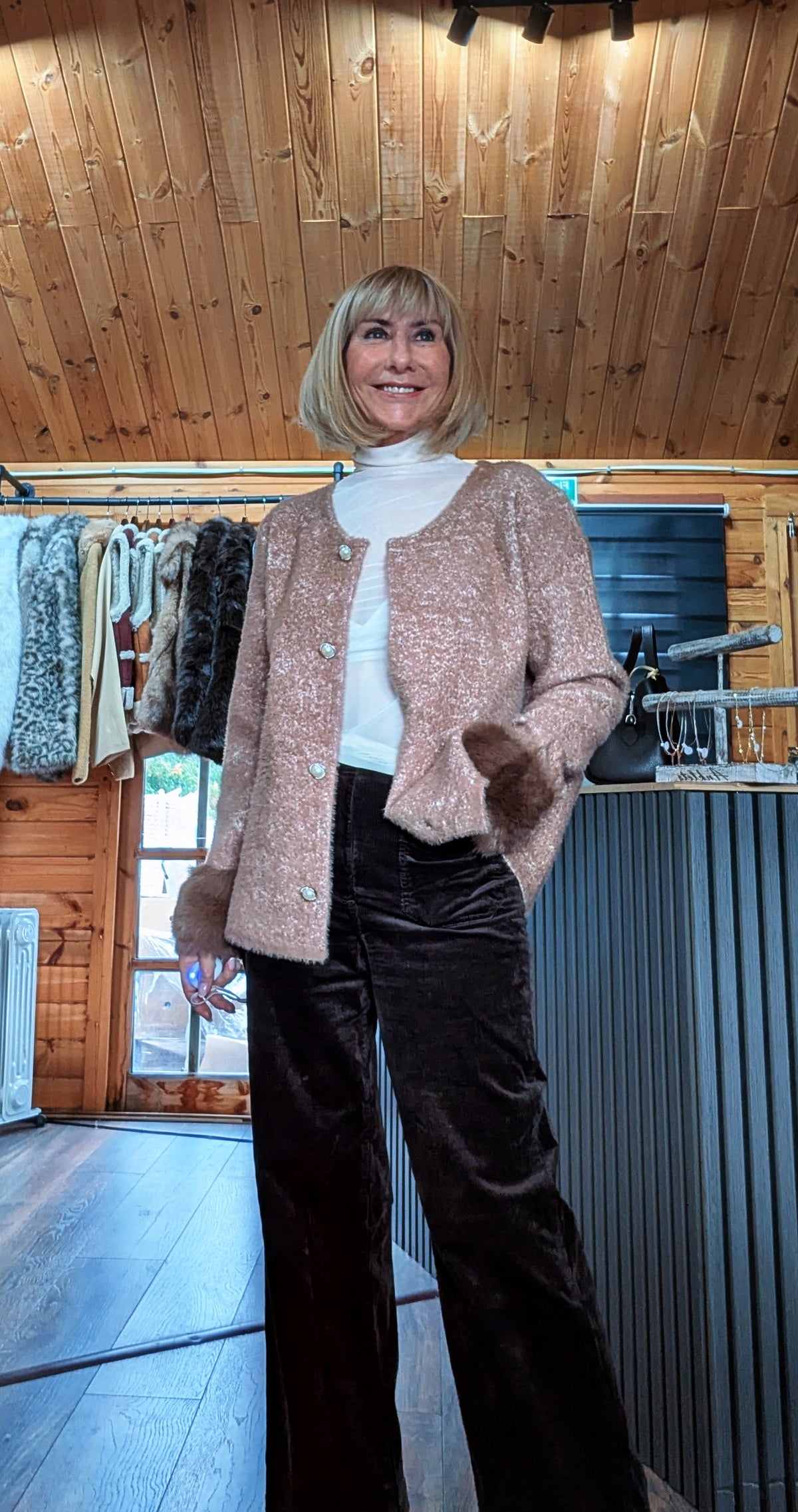 Liv chocolate textured cardigan styled with a white top and dark trousers