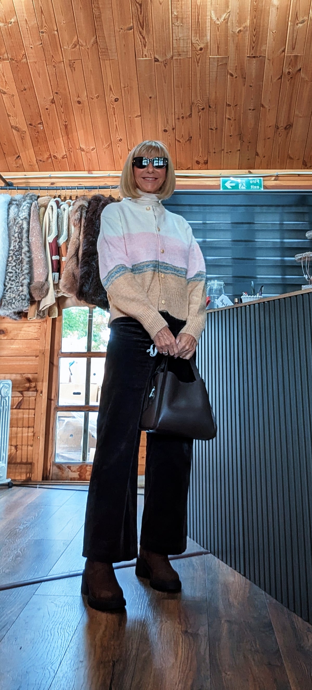 Helen pink colour block cardigan modelled with a black handbag held in front