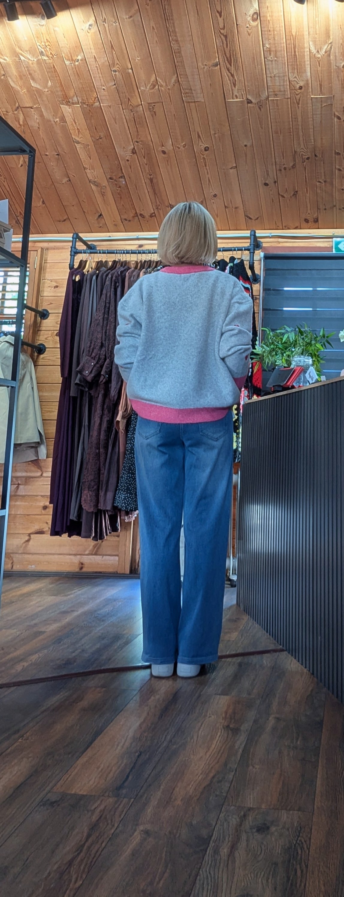 Grey women’s cardigan with pink heart design