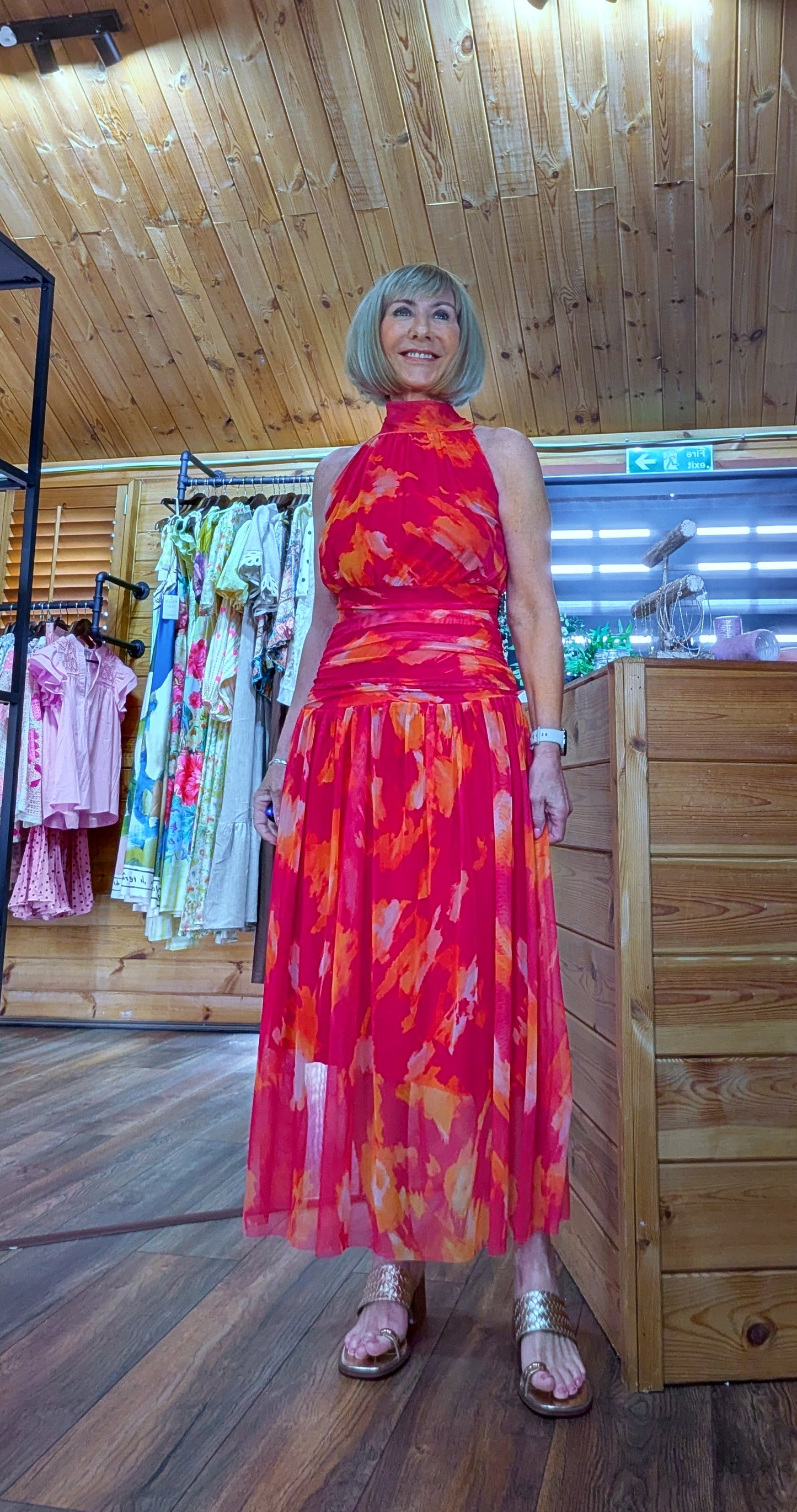 Red halterneck ruched waist dress