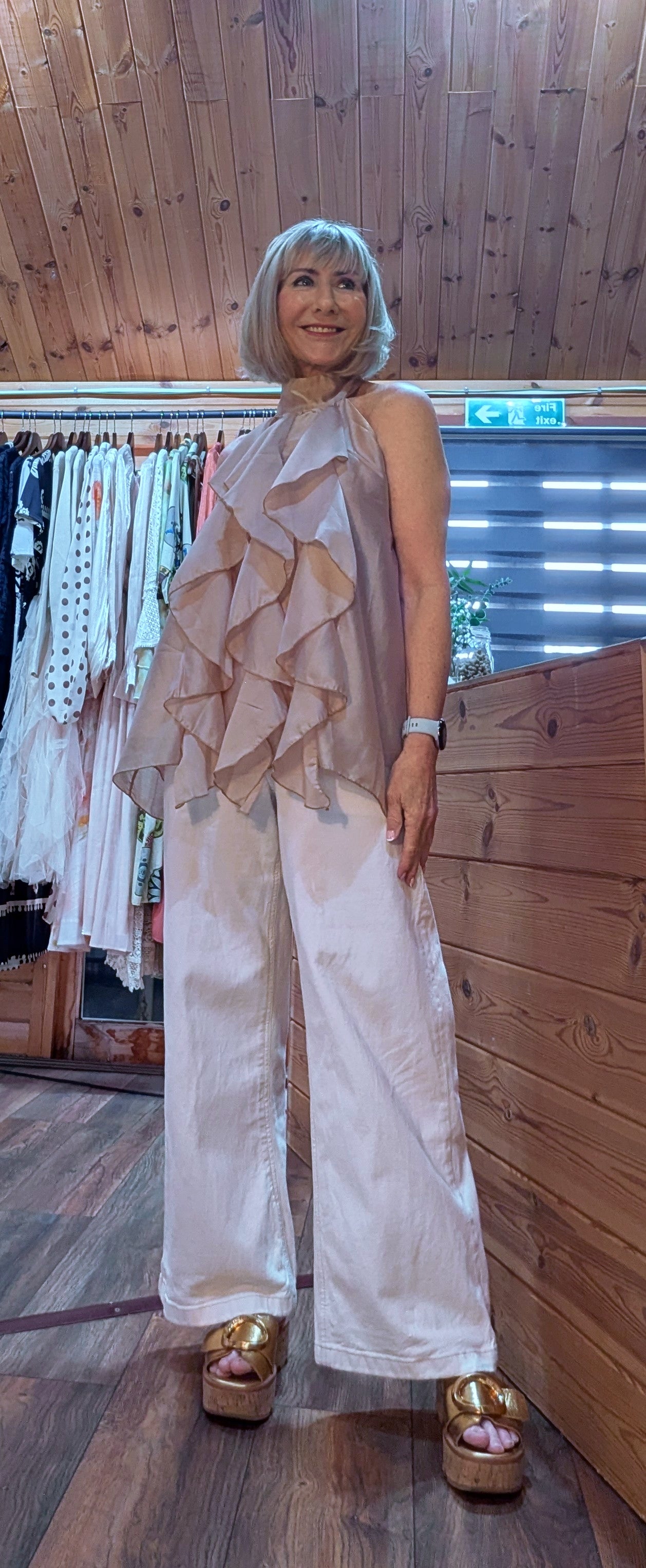 Halterneck backless blouse outfit with wide leg jeans