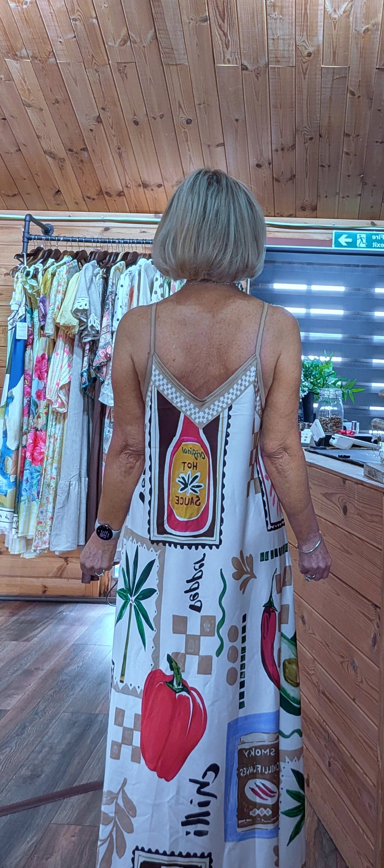 Boutique holiday dress in viscose and elastane blend at the rear