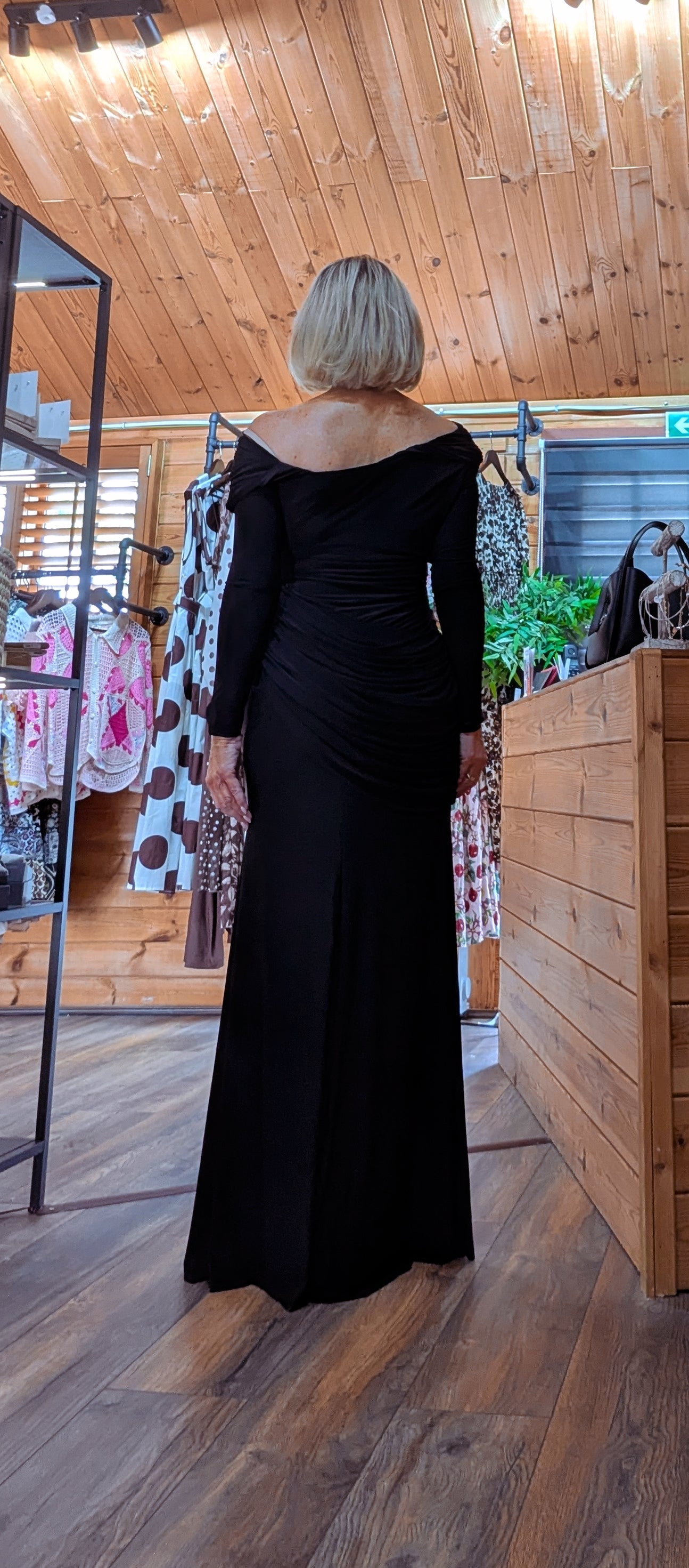Close-up of the Tilda dress  at the rear showing the softly draped neckline and stretch fabric.