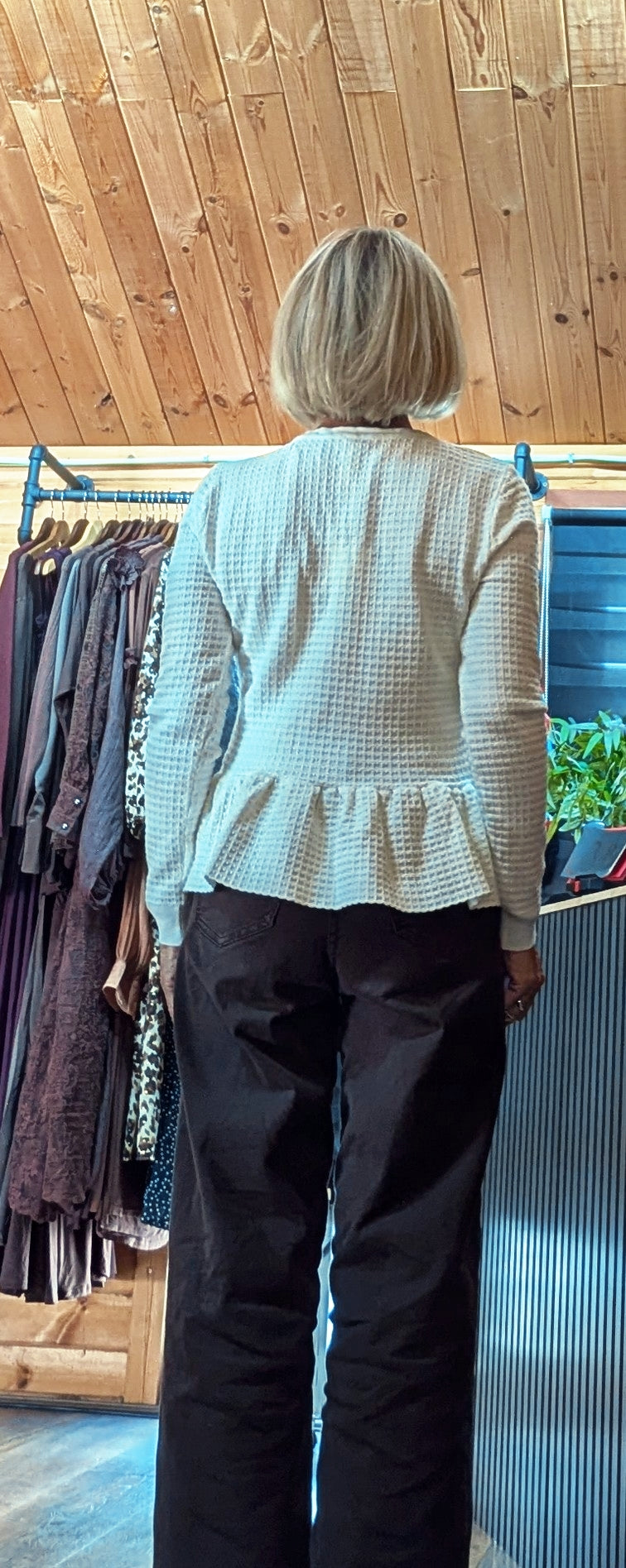 Women’s ivory textured cardigan with gathered peplum hem rear view