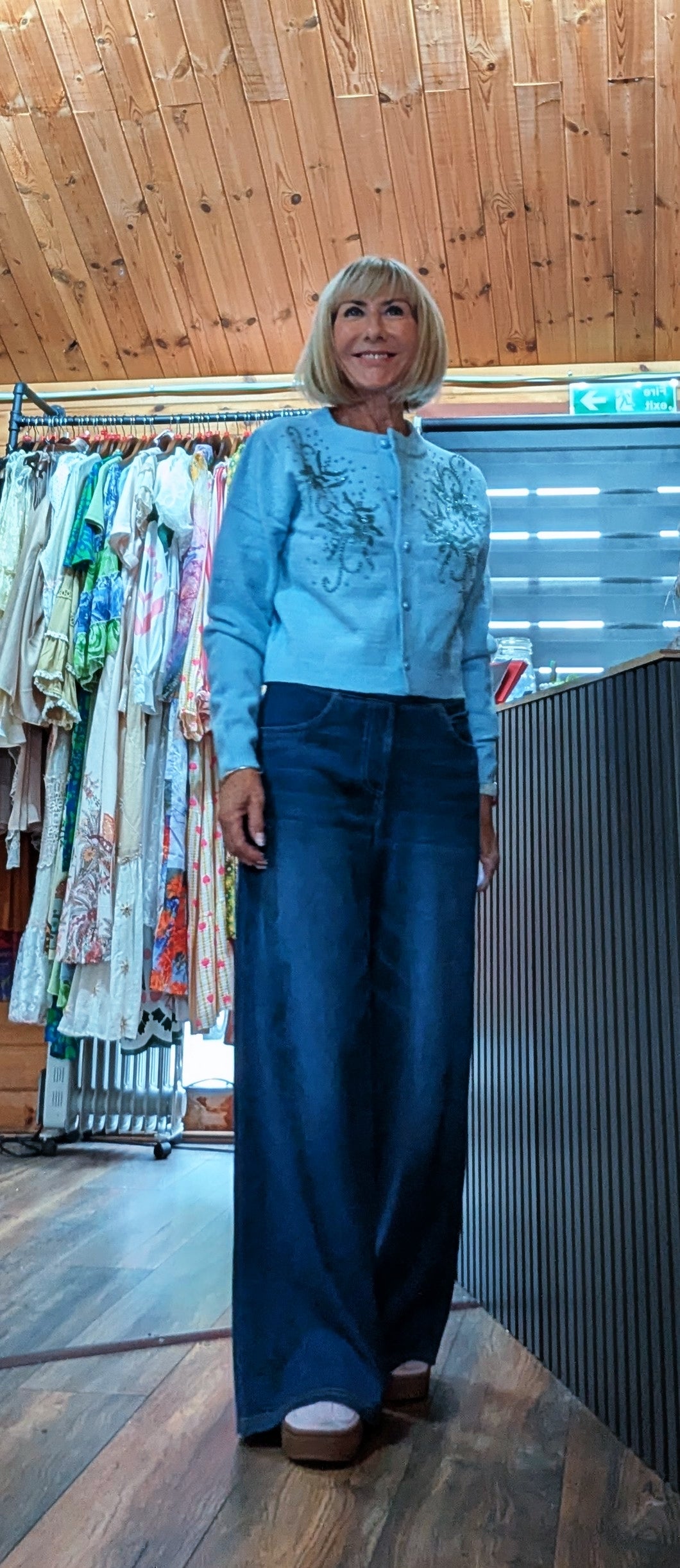 Light blue cardigan styled with wide leg jeans uk boutique 