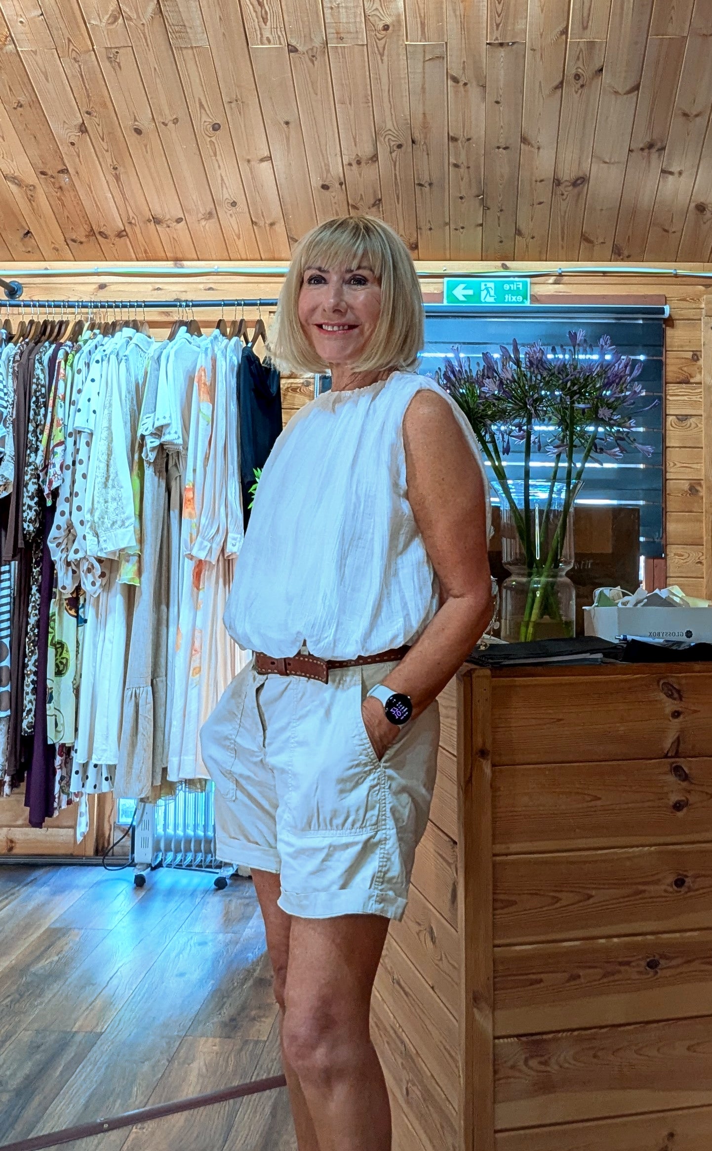 Full view of the Francis cotton blouse styled with summer shorts