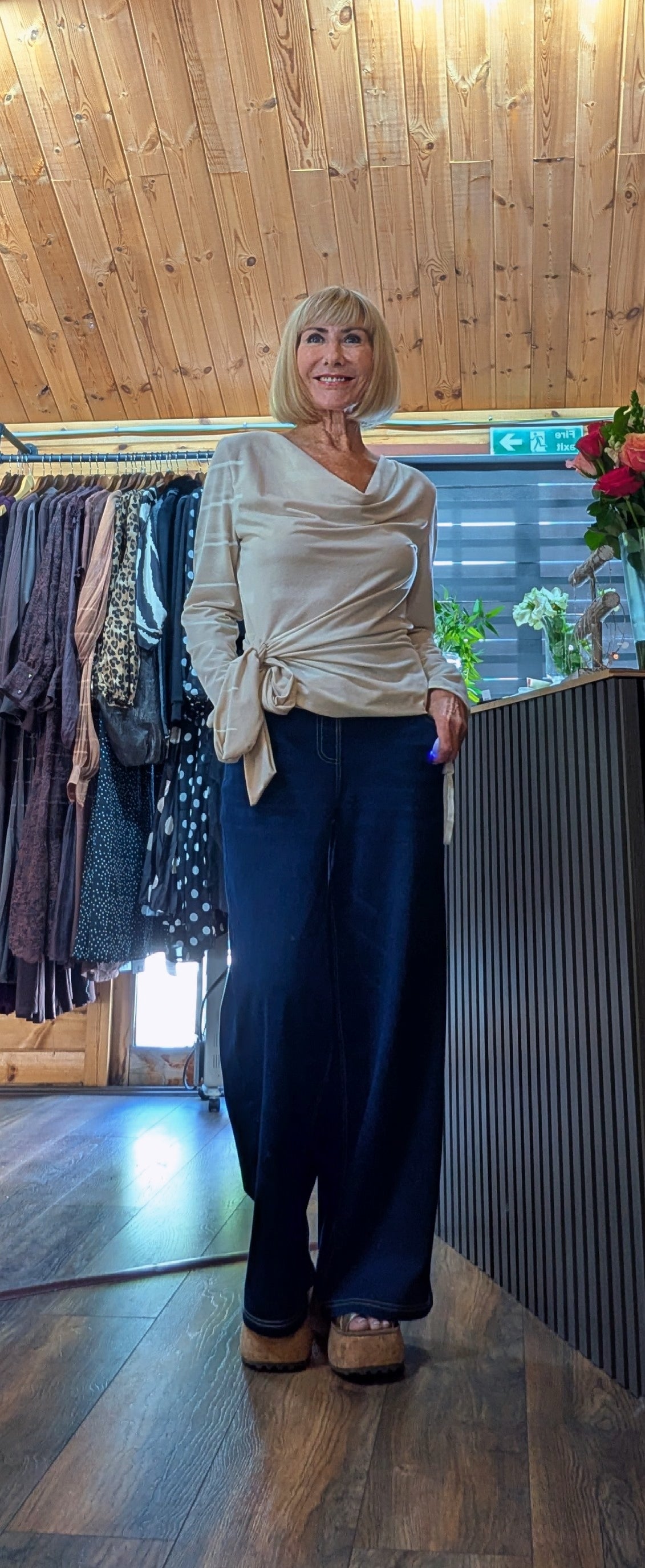 Soft stretch women’s top with side tie and long sleeves styled by ditsydi with wide leg jeans