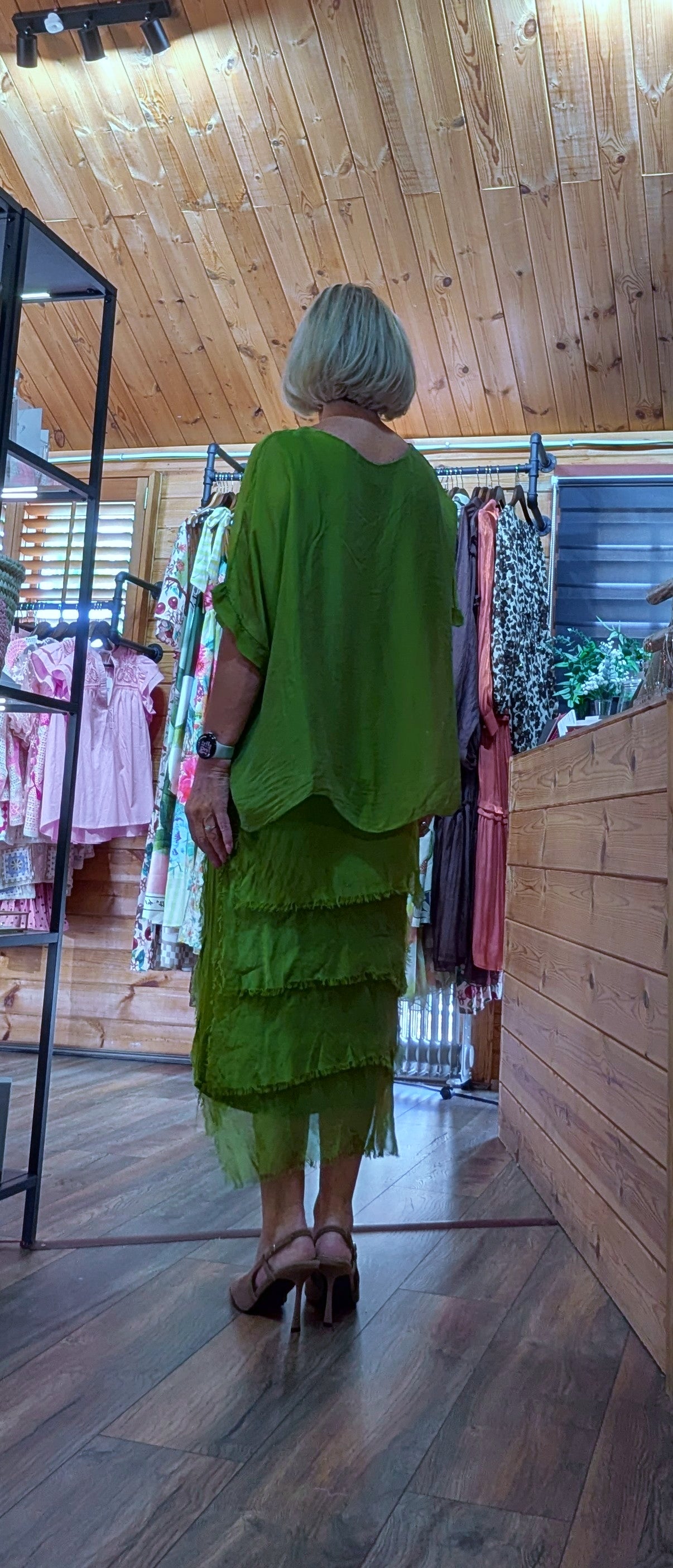 Rear view green occasion silk dress