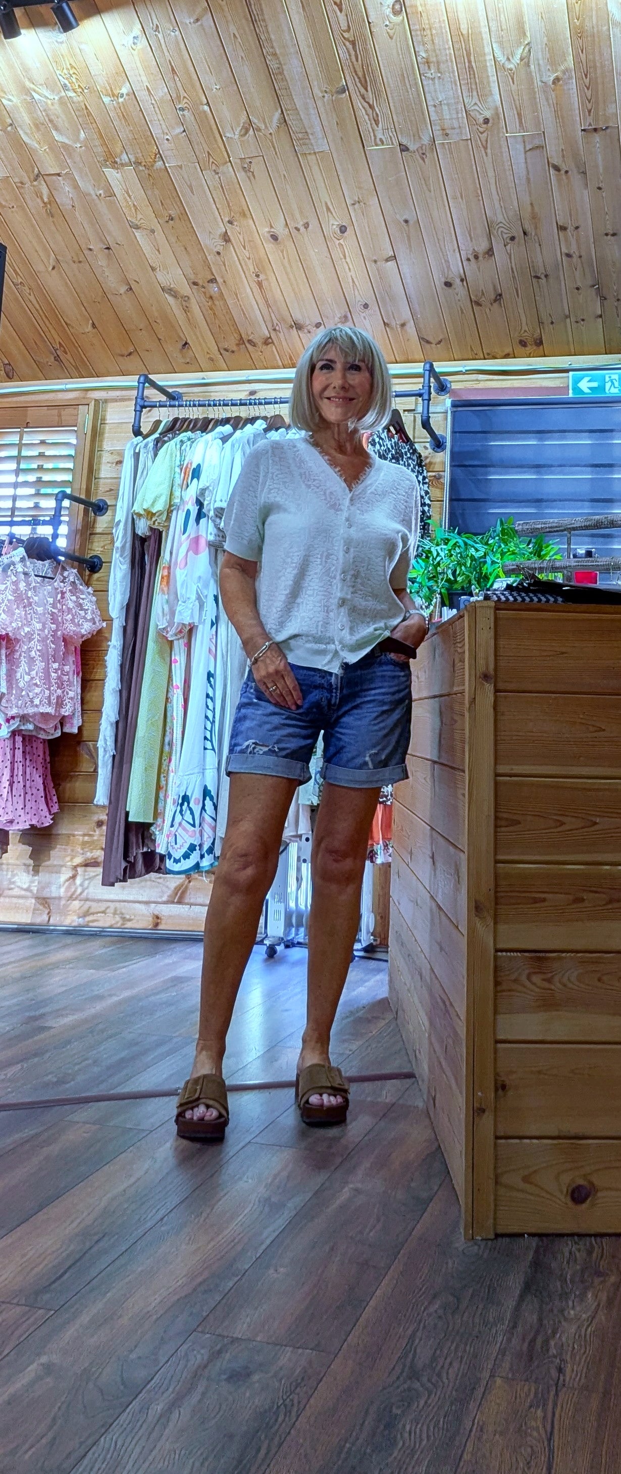 Ditsydi wearing Adeline cardigan with shorts and chunky sandals