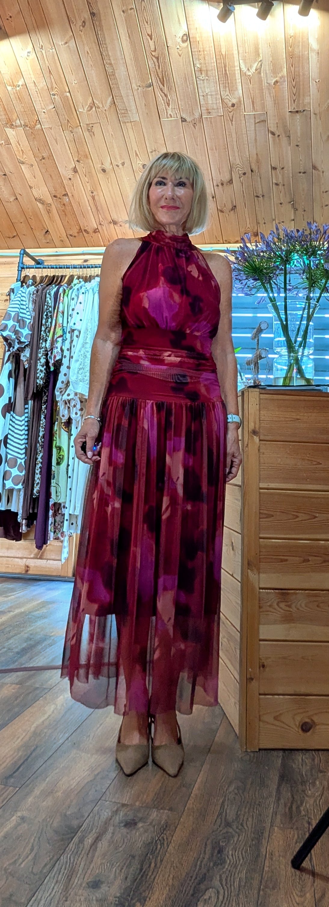 Close up frnt view of Natasha Autumn dinner dress in fucshia  with sheer skirt styled by ditsydi with a draped waist