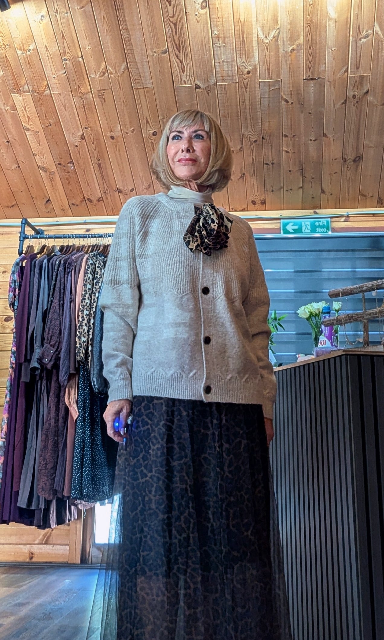 Cream alpaca blend cardigan with statement leopard bow