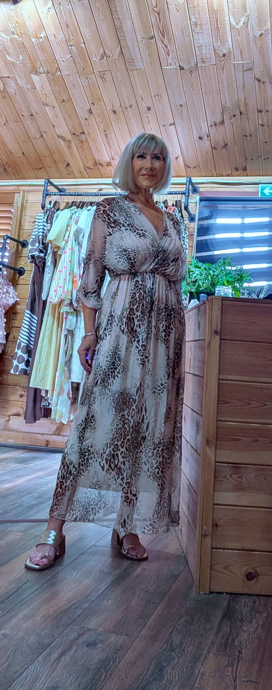 Front view of the Dorian  leopard print silk blend dress featuring an elasticated waist and elegant maxi-length 