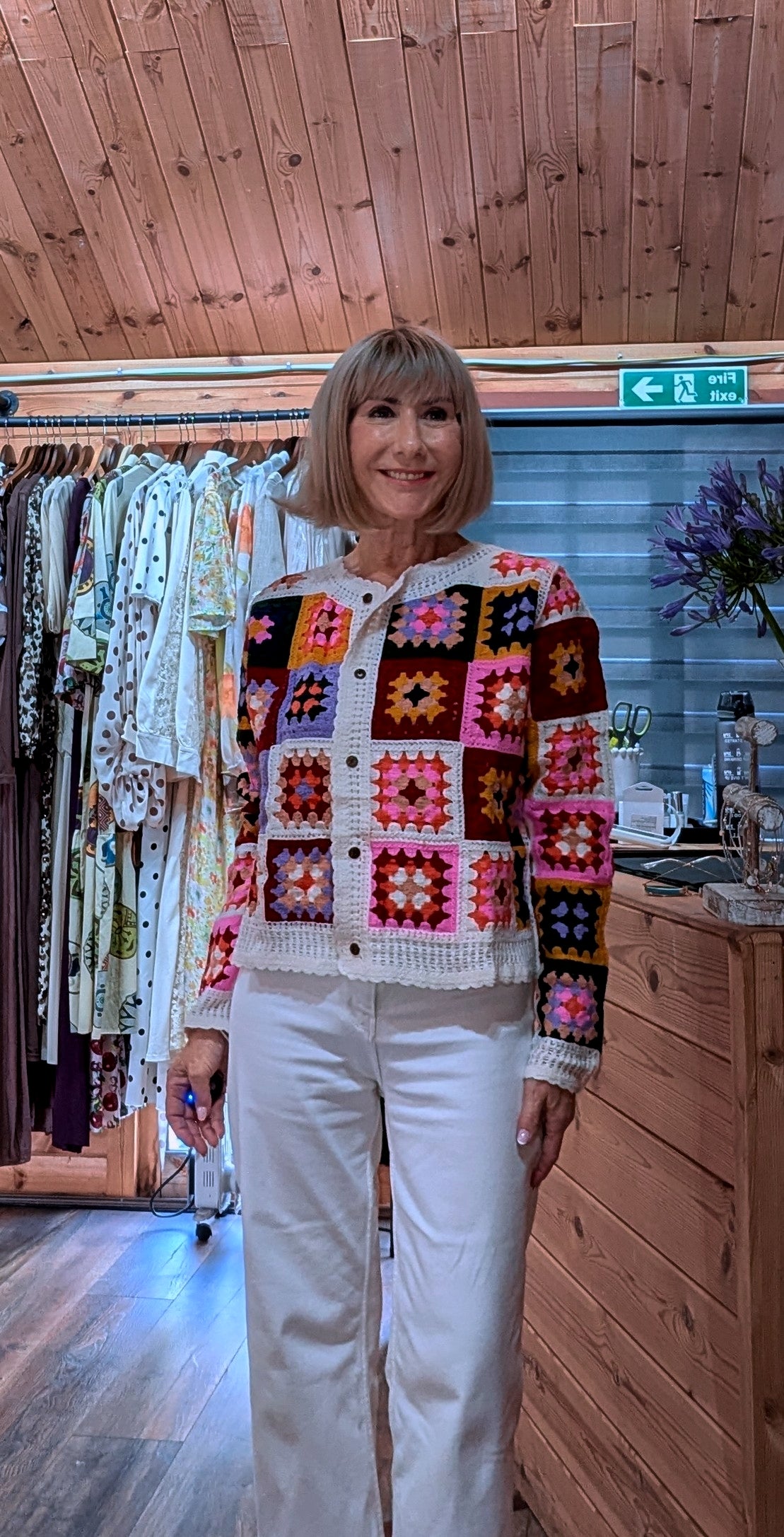 Close up view Tara Crocheted Multicoloured Cardigan with long sleeves and right colours