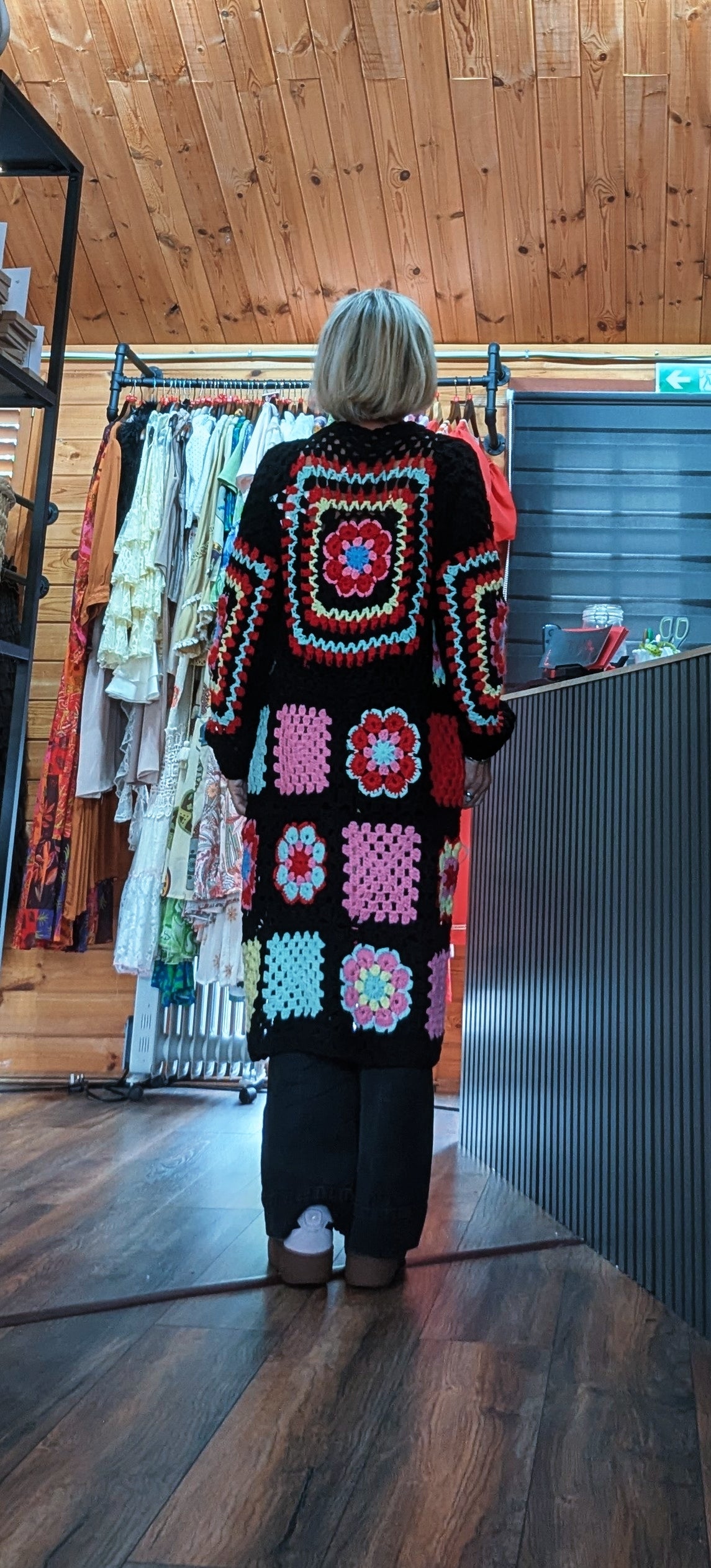 Fia women’s longline floral crochet-style cardigan in black, fitting UK sizes 8–14 rear view 
 