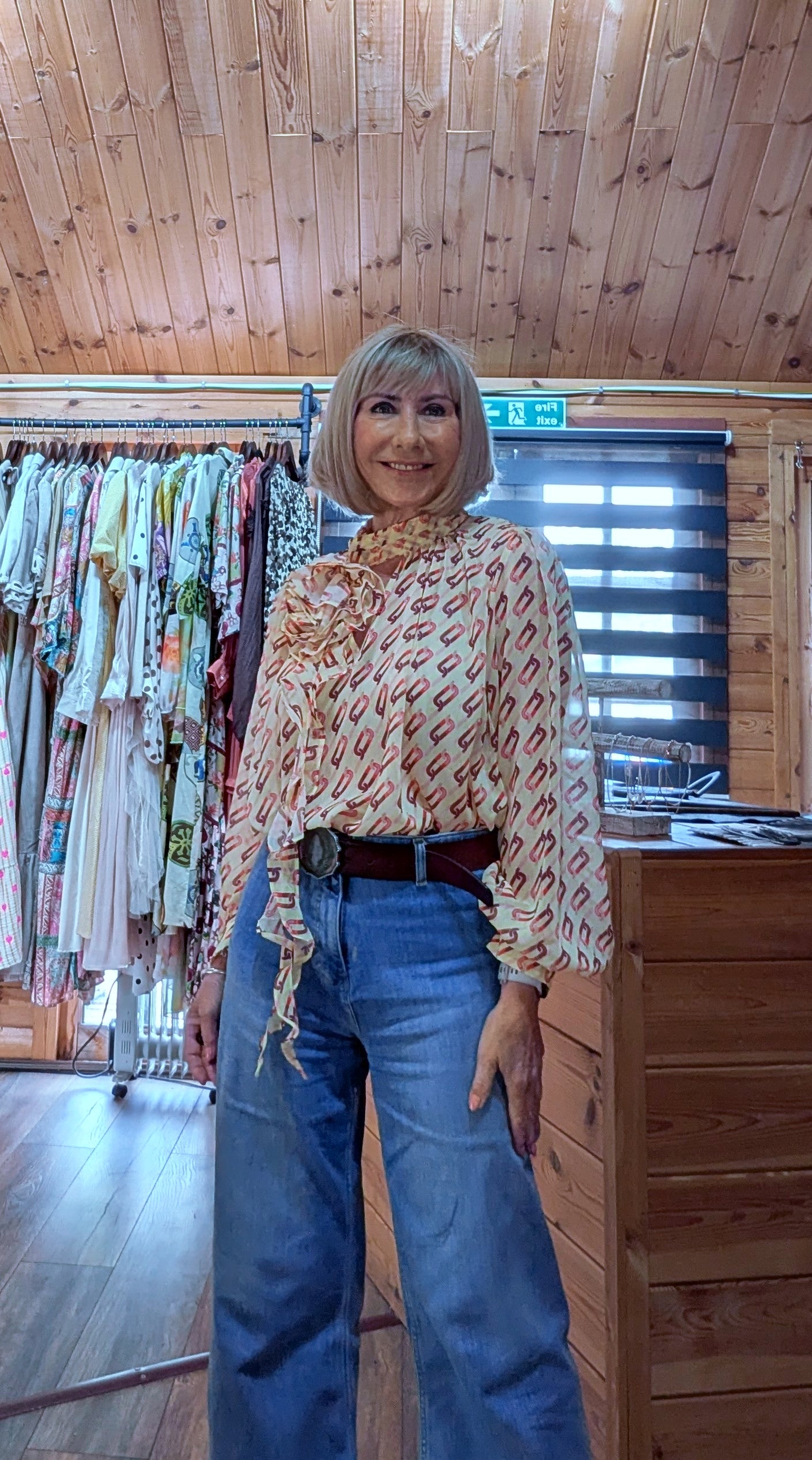 Ditsydi wearing Emery floral detail blouse styled with high rise jeans