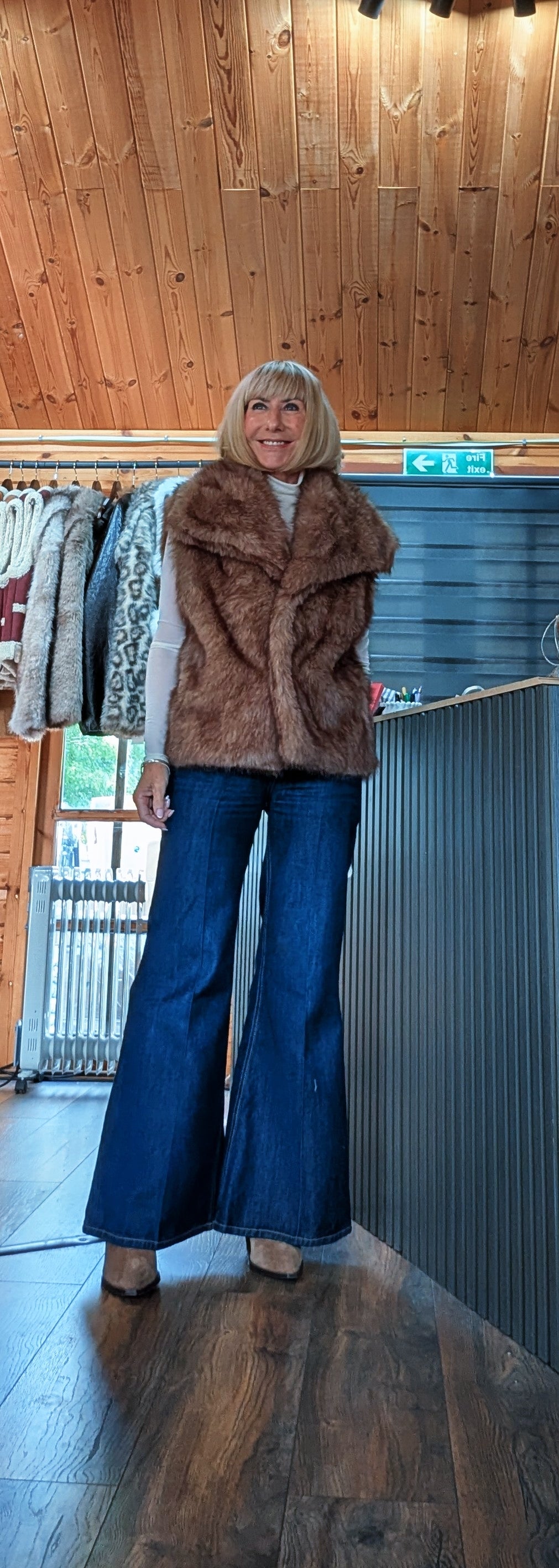 Front view of the Coco chocolate faux fur sleeveless gilet