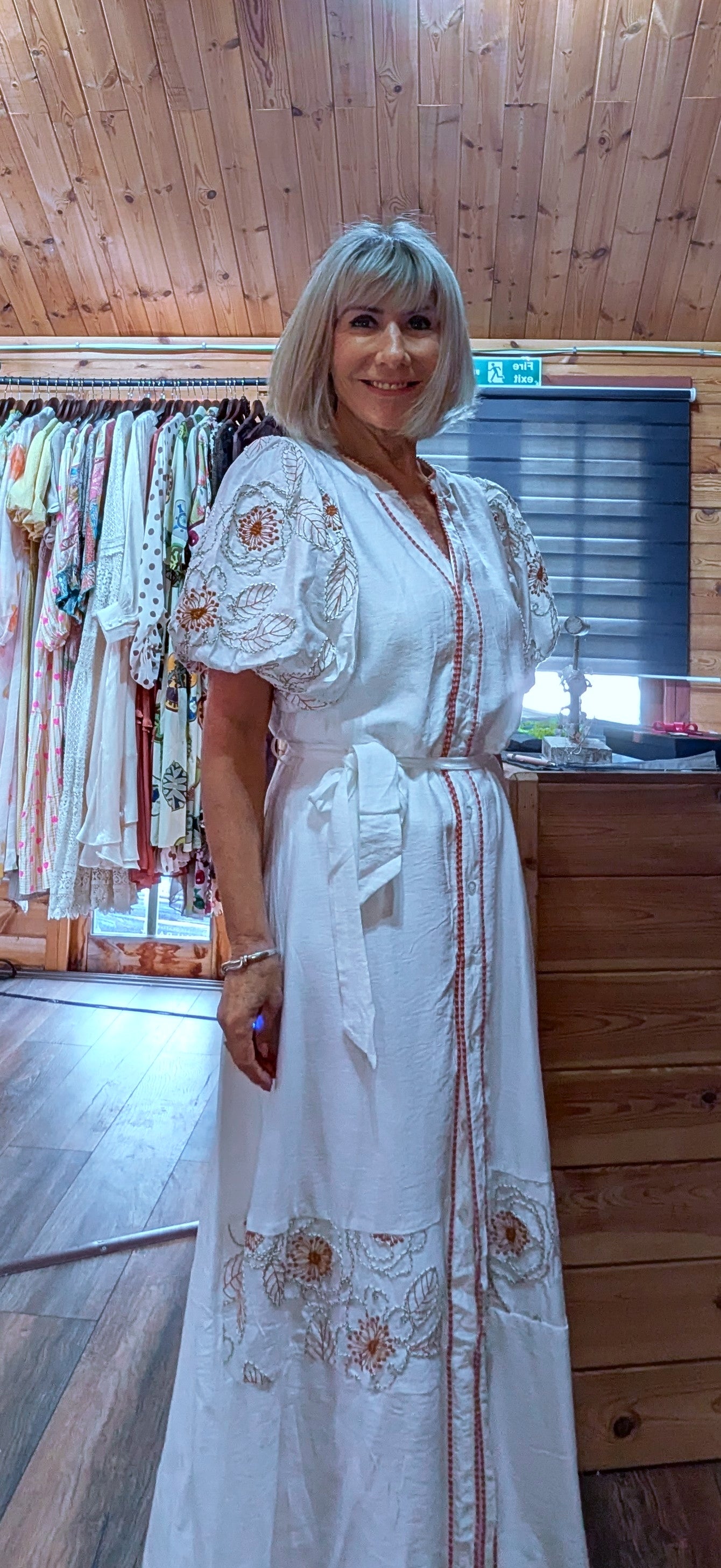 Close up of Sloane white dress embroidery detail