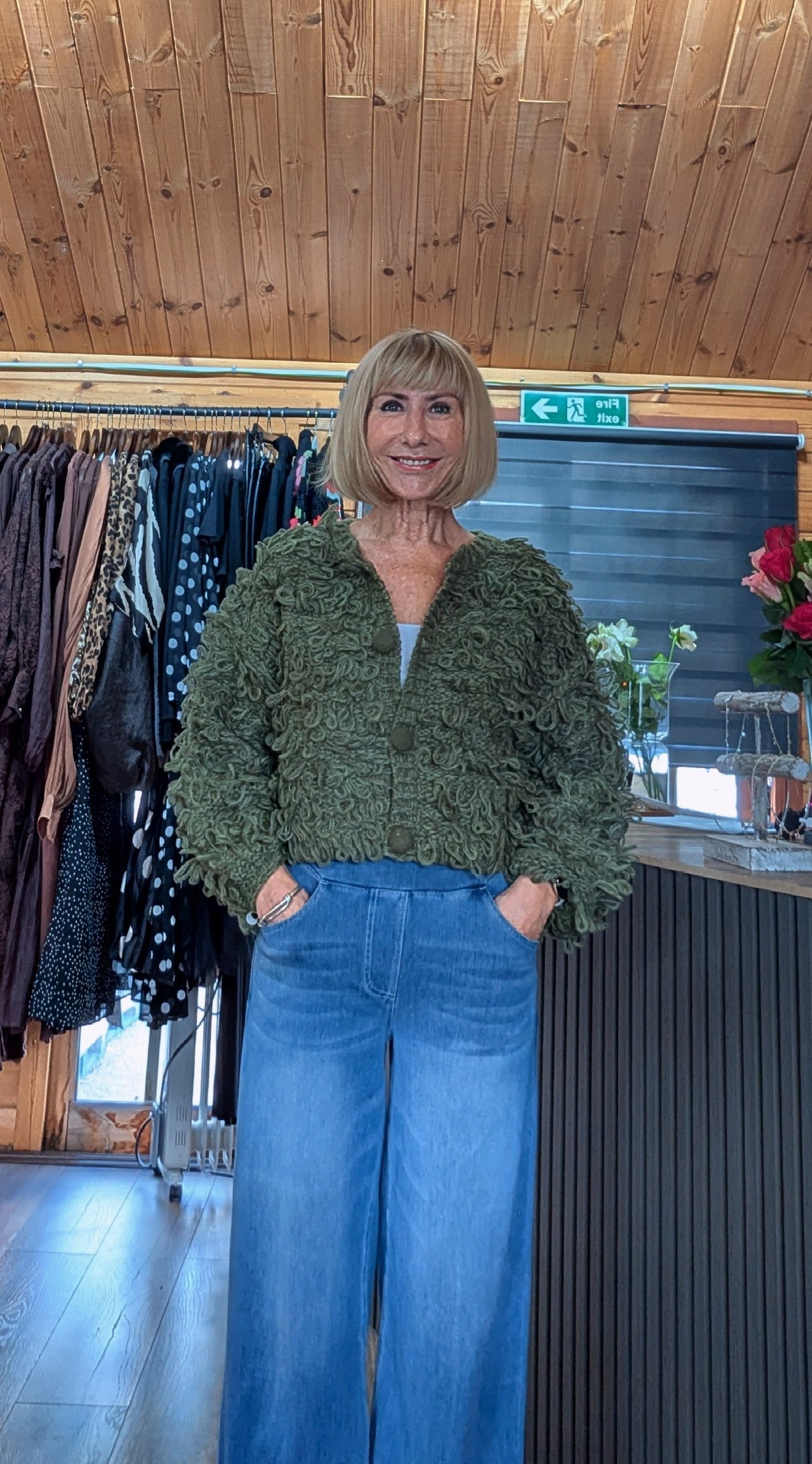 Close up view Dahlia olive green textured jumper with round neckline