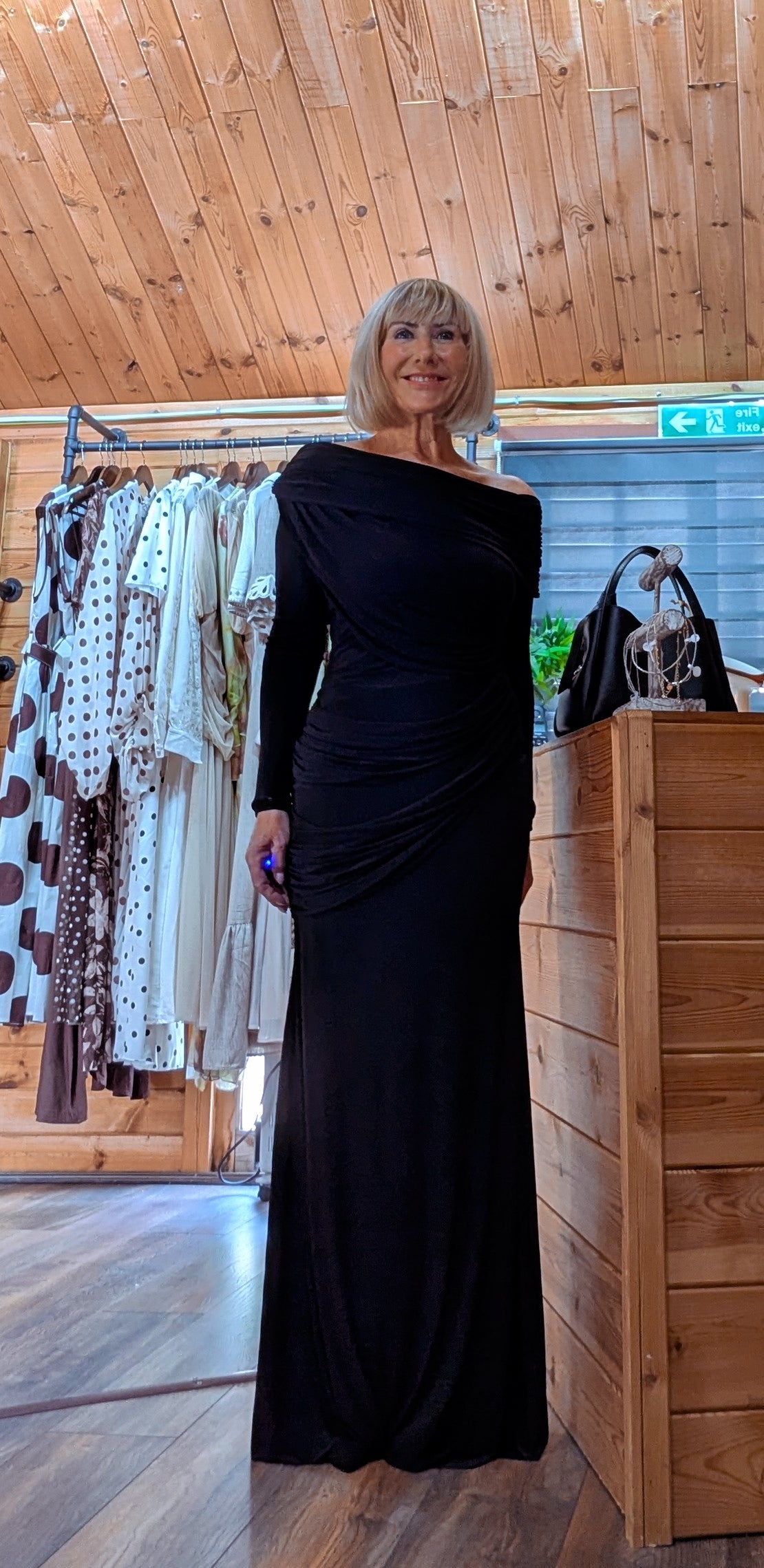 Full-length view of the Tilda black evening dress, available in UK sizes 8 to 16.
