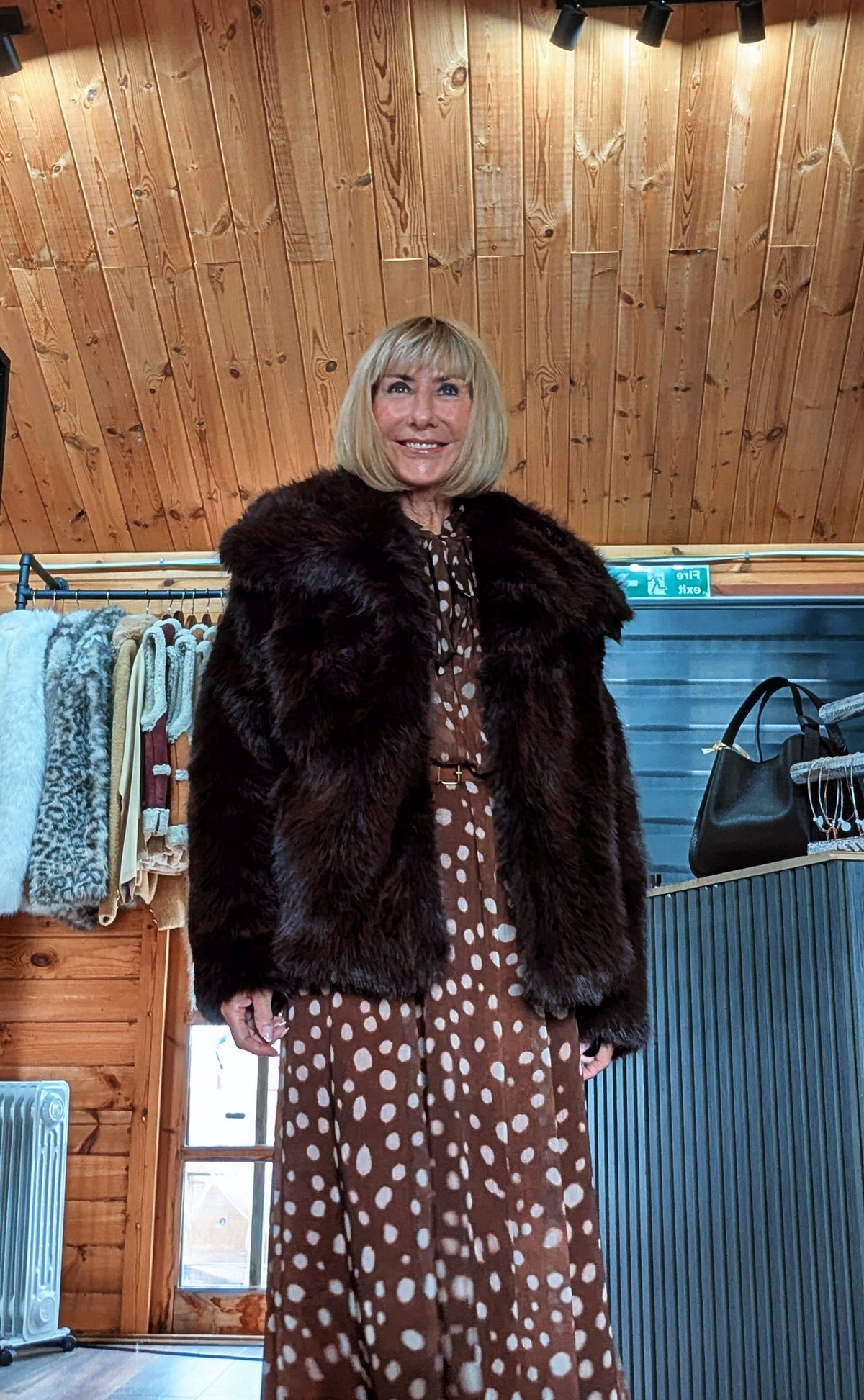 Closer front view of Bella chocolate faux fur jacket showing the wide collar and plush texture