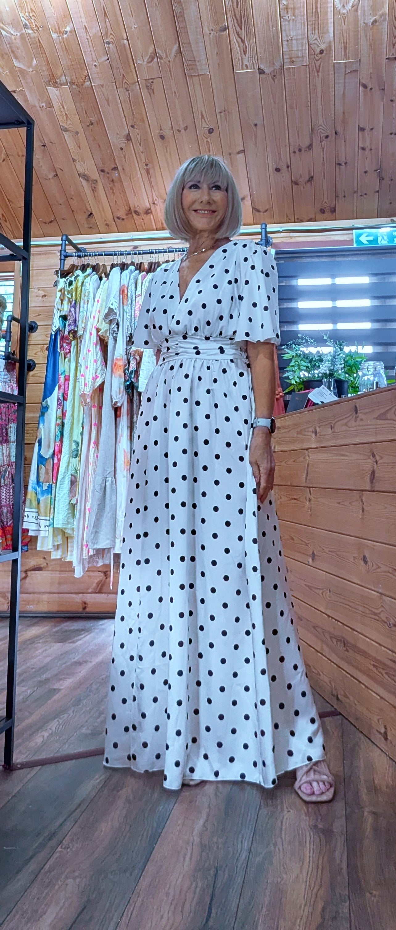 Polka dot wedding guest dress for summer occasions in white with deep split