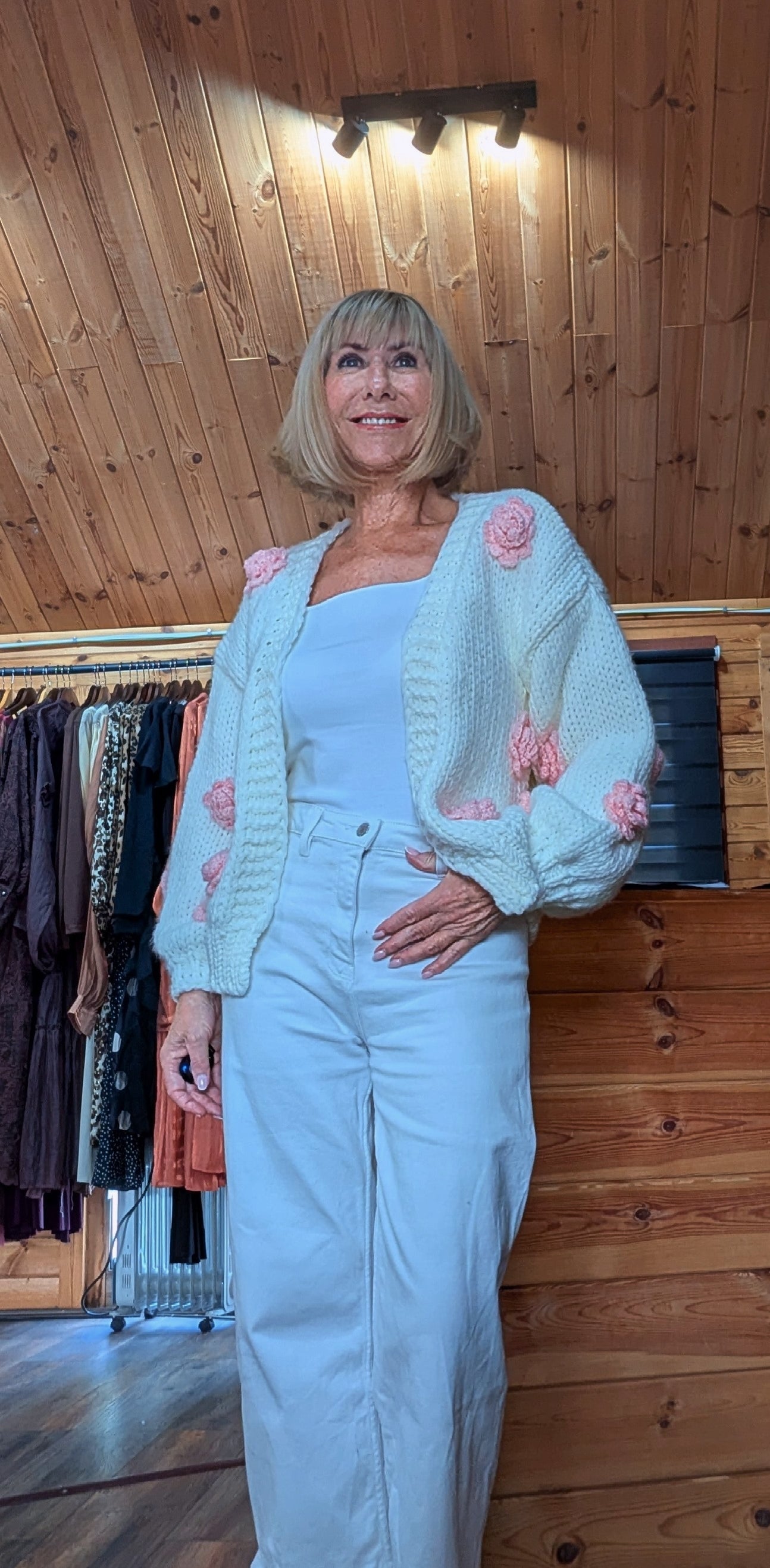 Cream floral knit cardigan with pink roses and balloon sleeves