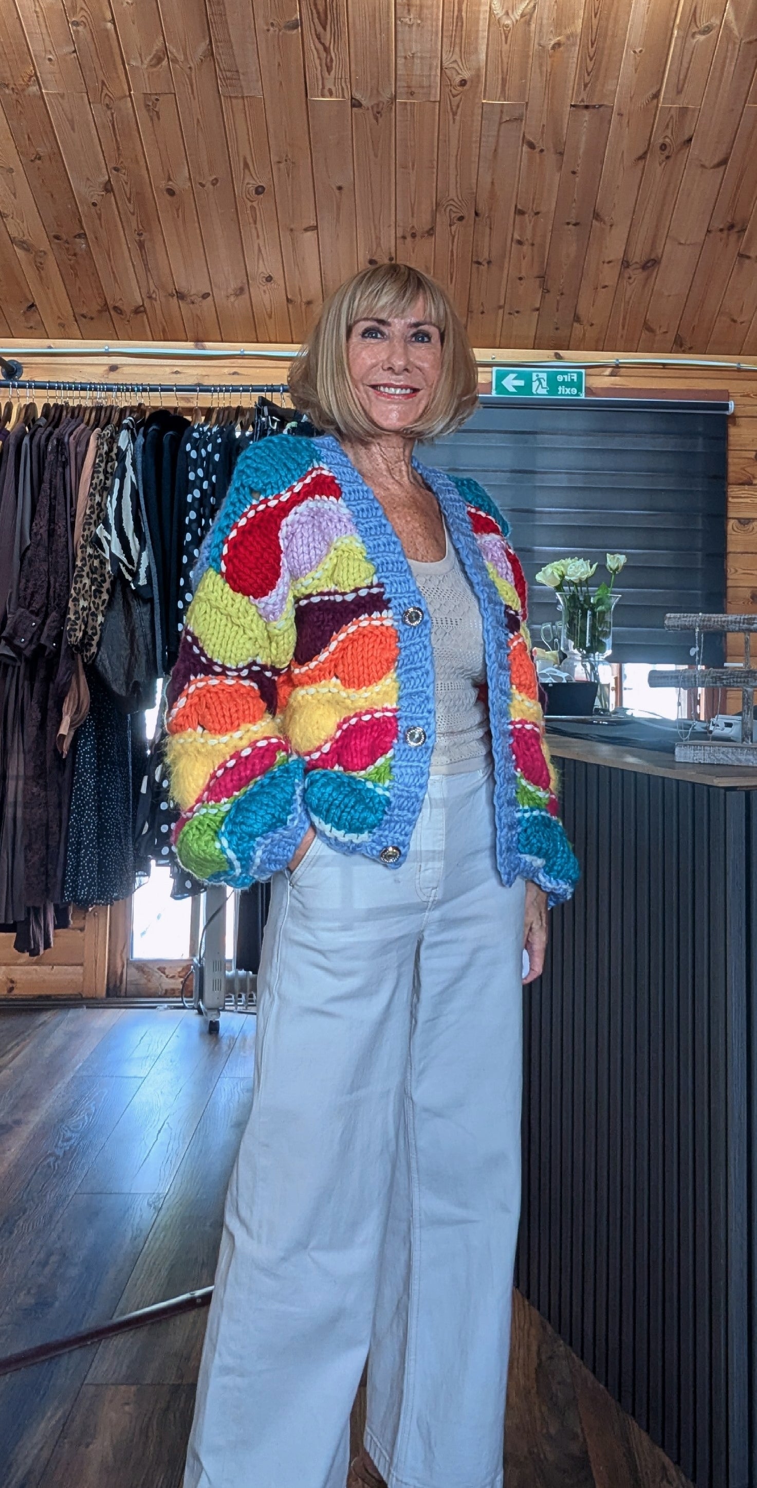 Lulu bright knit cardigan styled with denim jeans