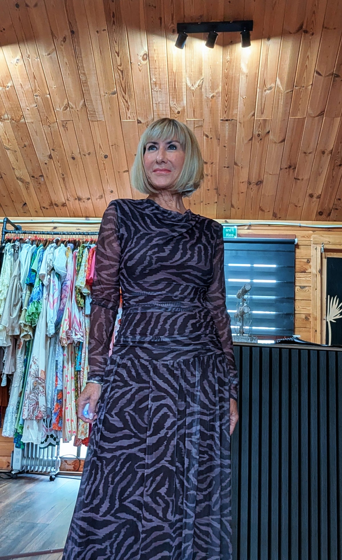 Waverley chocolate animal print maxi dress with long sleeves close up view styled by ditsydi