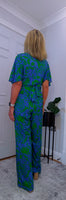 Justina Tropical Green - Fuchsia -Angel Sleeve Maxi Jumpsuit with Twist Detail